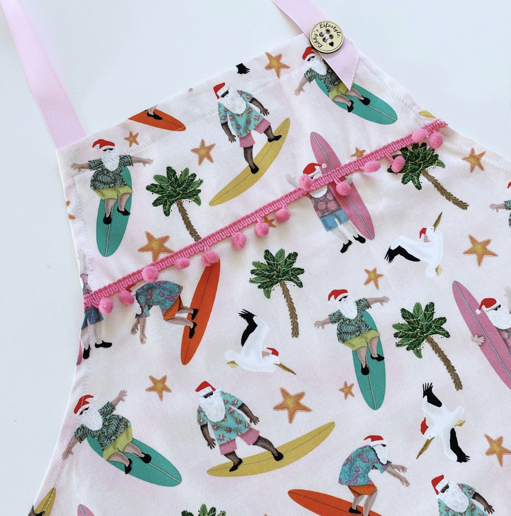 Surfing Santas Christmas pinafore ladies apron.