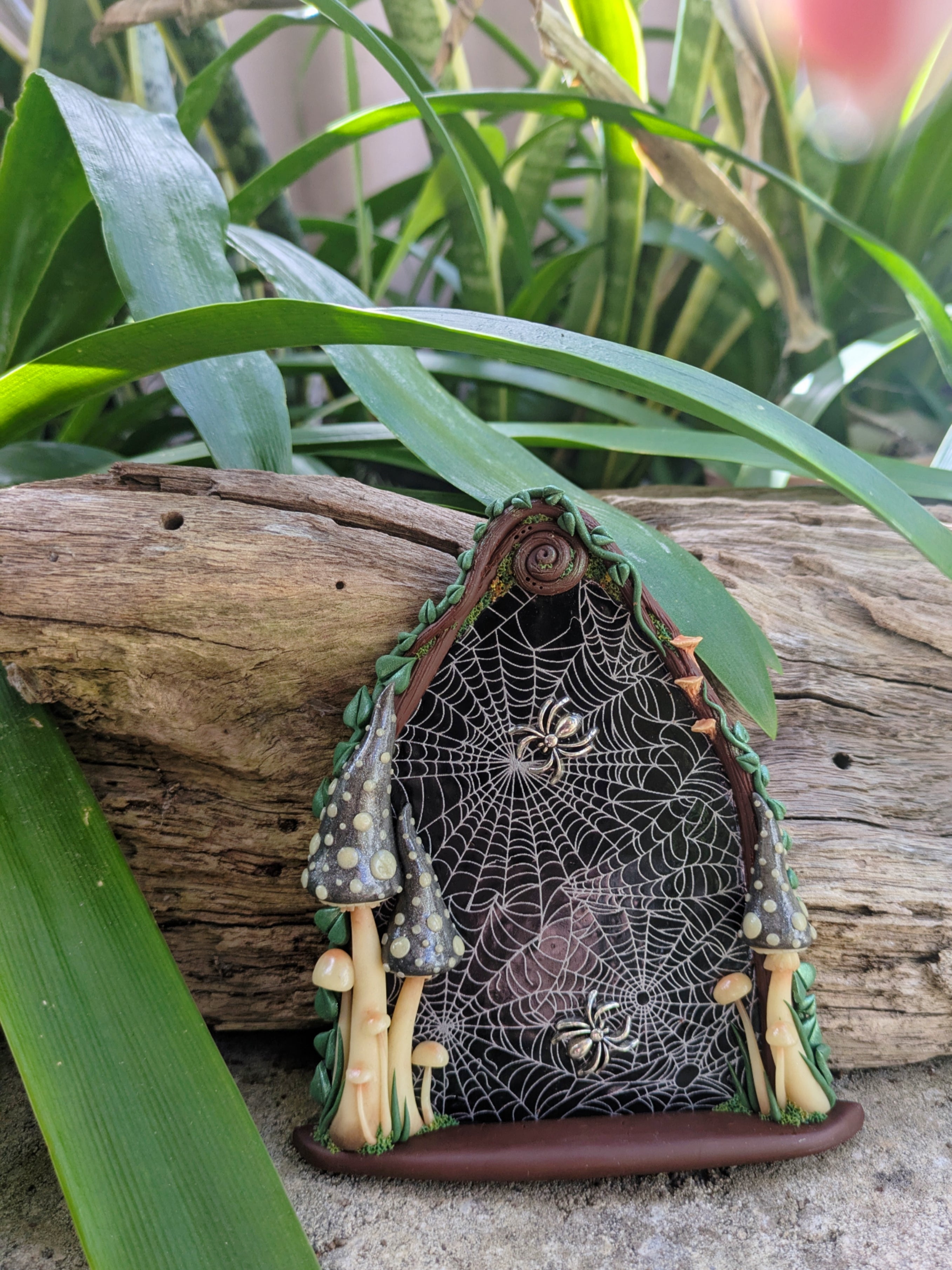 Spiderweb Forest Fairy door with glow in the dark mushrooms