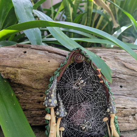 Spiderweb Forest Fairy door with glow in the dark mushrooms