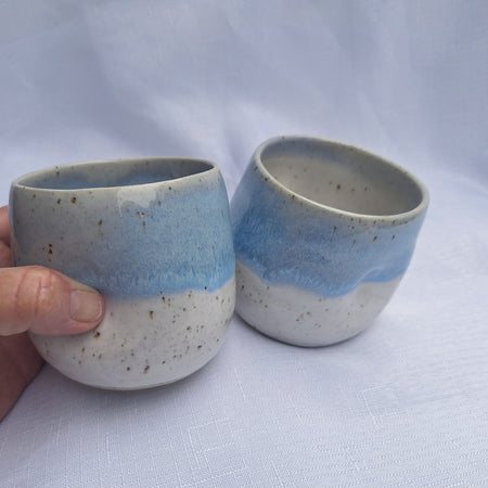 Blue and white speckled ceramic dimple mugs
