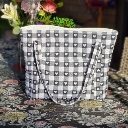 Striking black an white bag with white hearts set on black squares