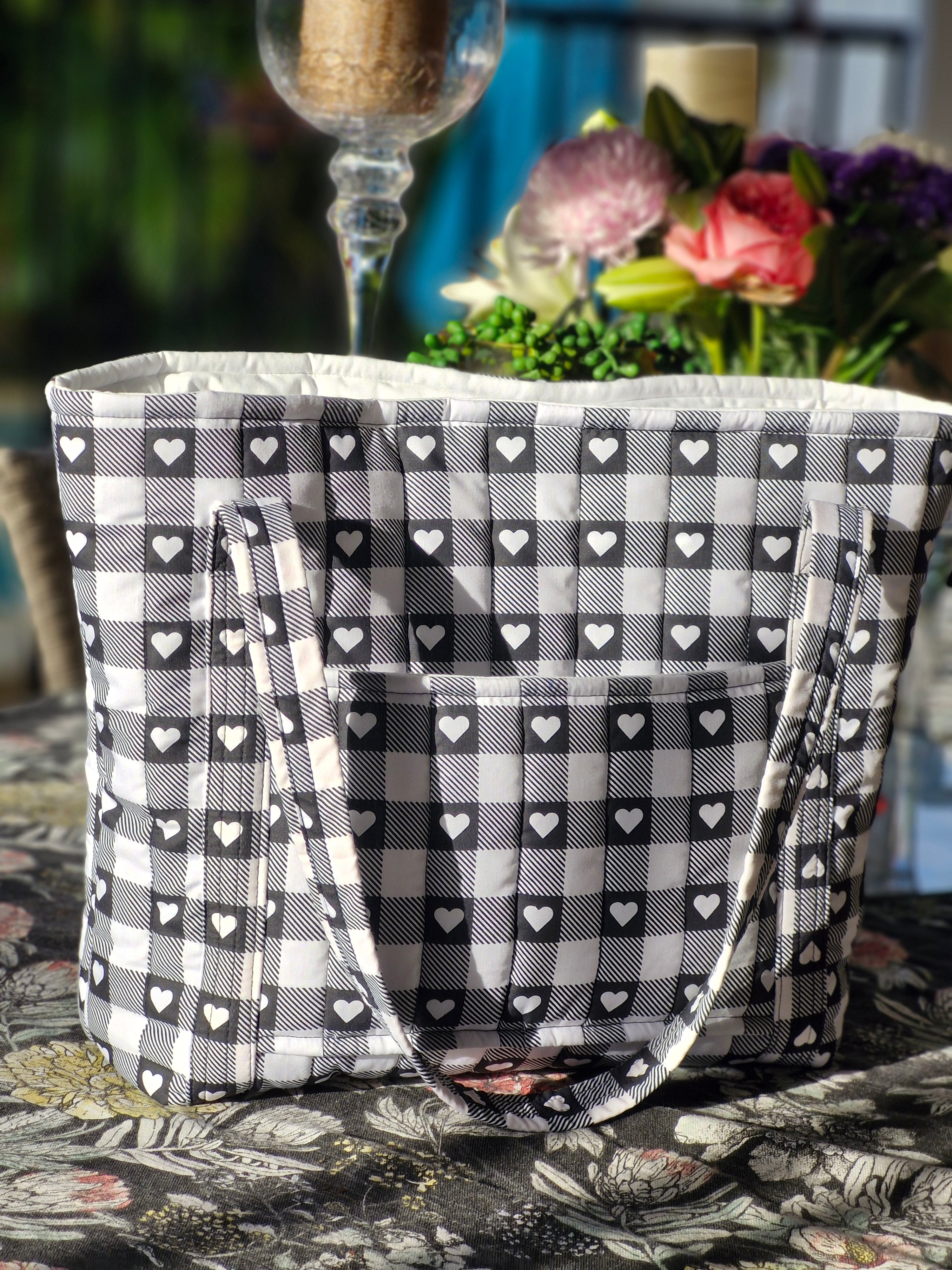 Striking black an white bag with white hearts set on black squares