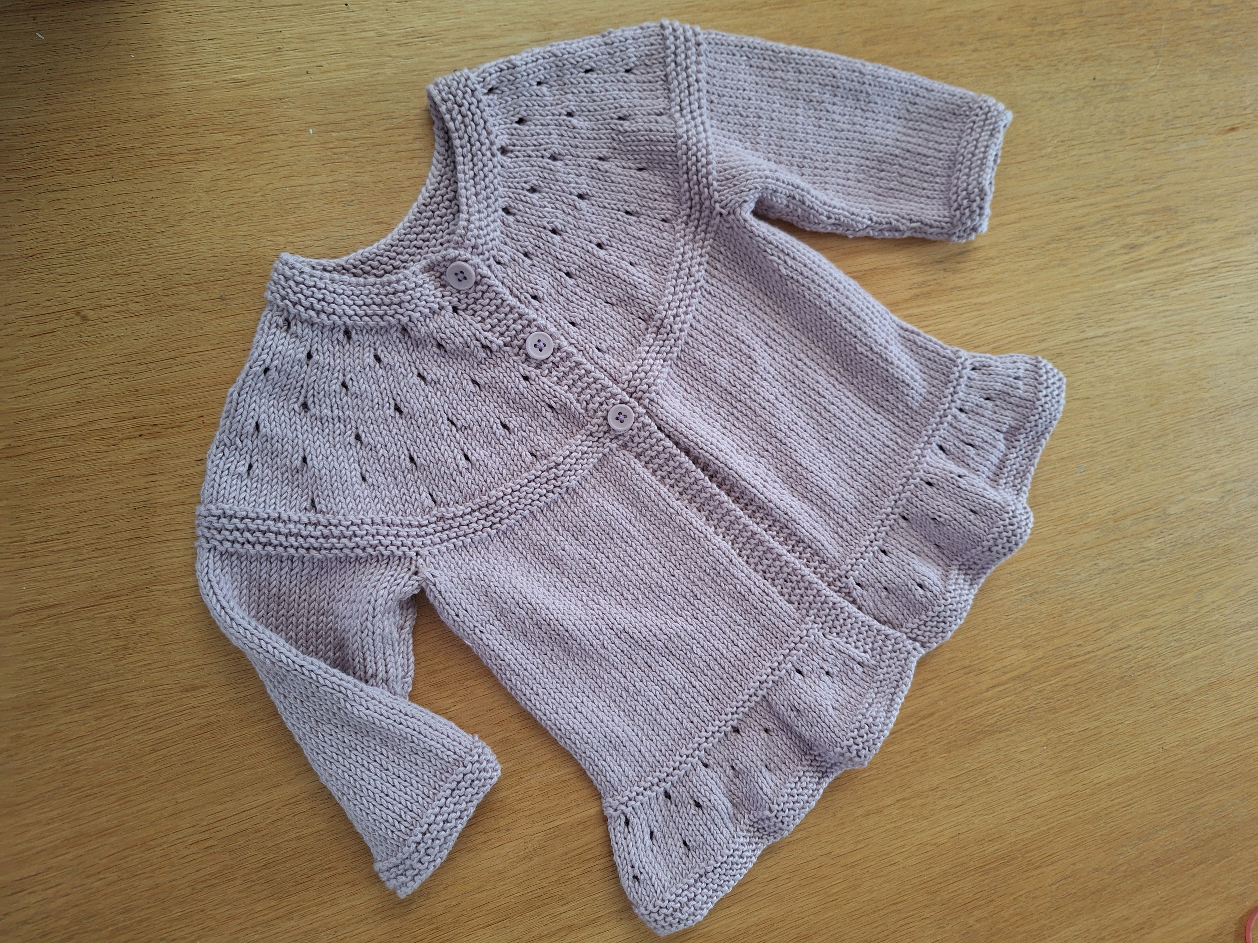 Handknitted Baby Cardigan in 100% natural Lilac yarn
