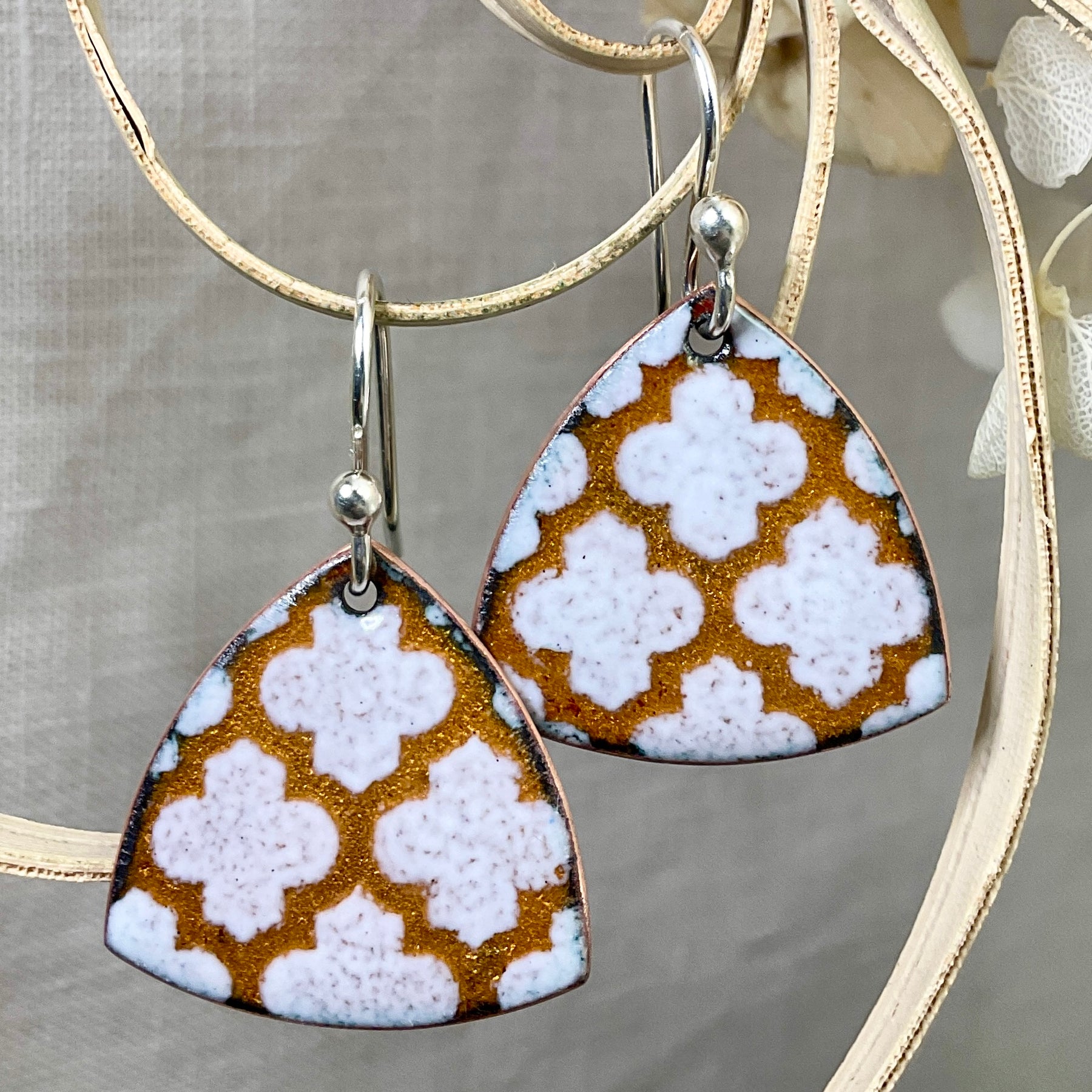 Golden and white pattern earrings. Enamel. Handmade