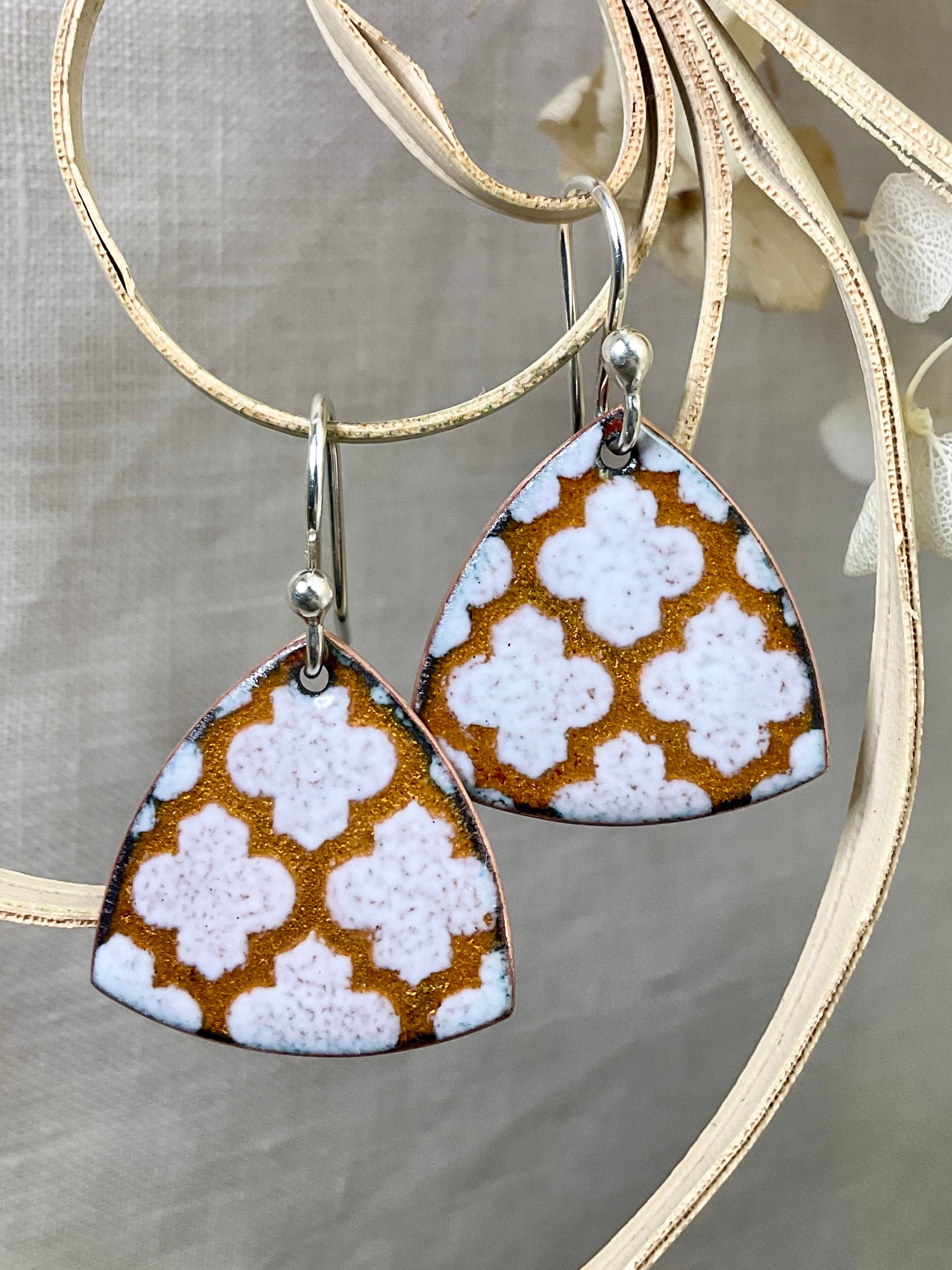 Golden and white pattern earrings. Enamel. Handmade