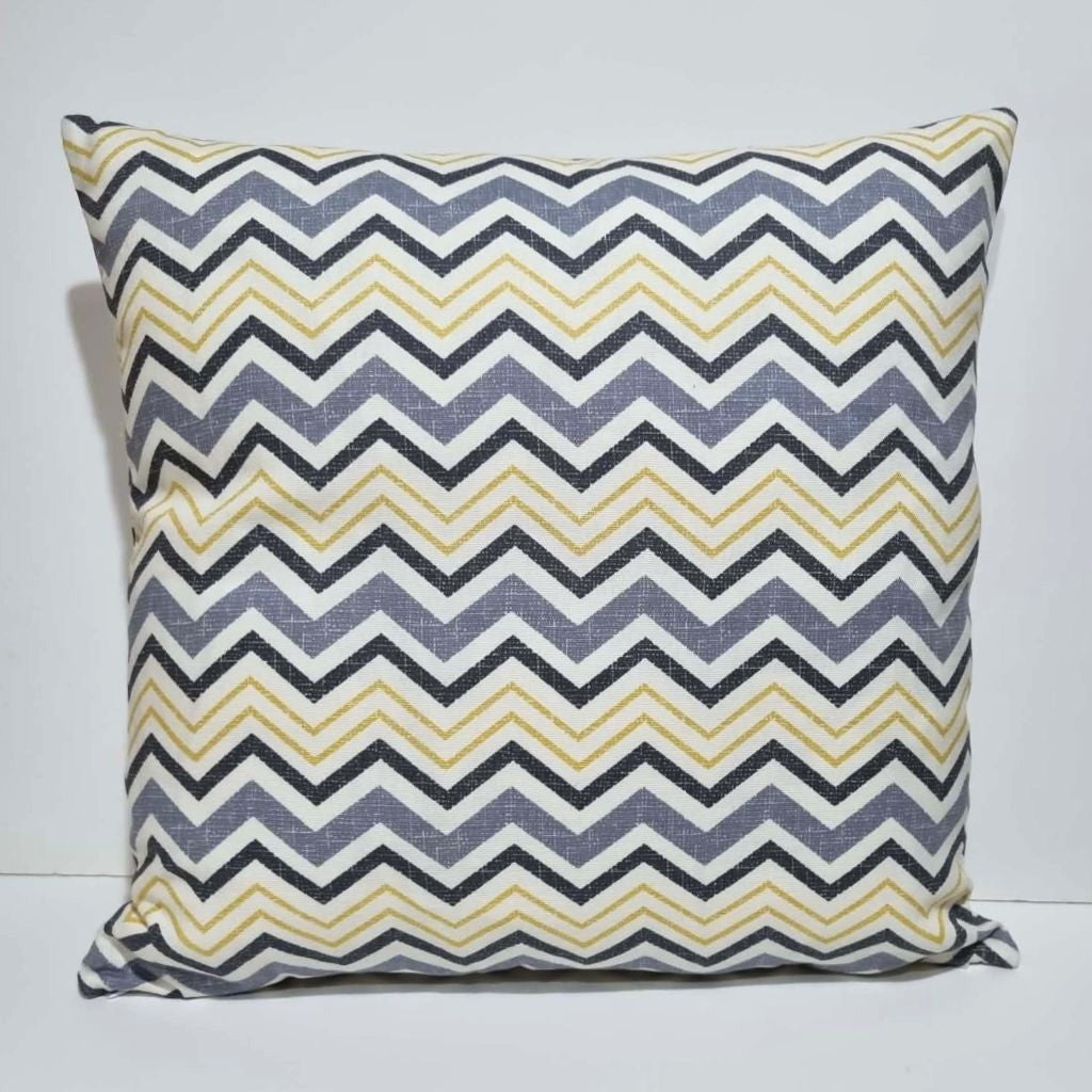 Geometric grey and yellow cushion cover. Modern living