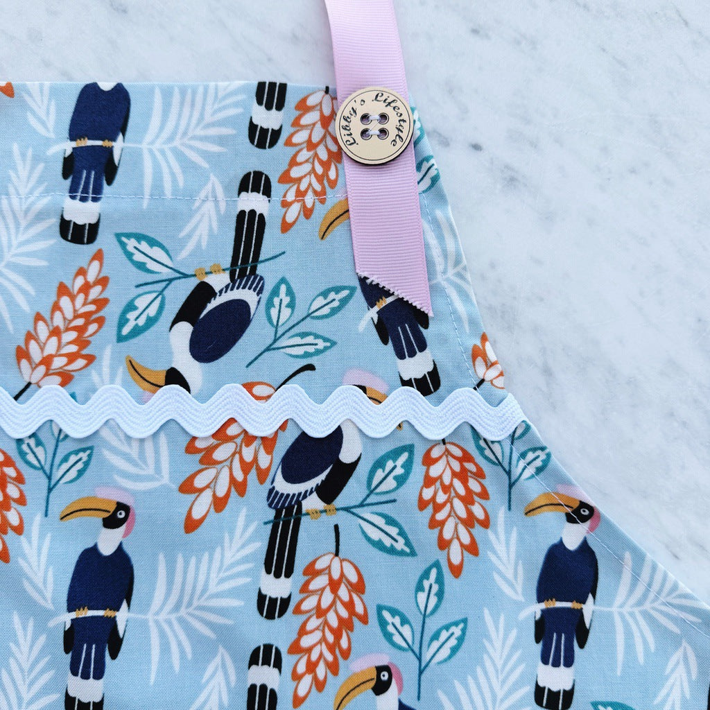 Toucans pinafore ladies apron with pocket.