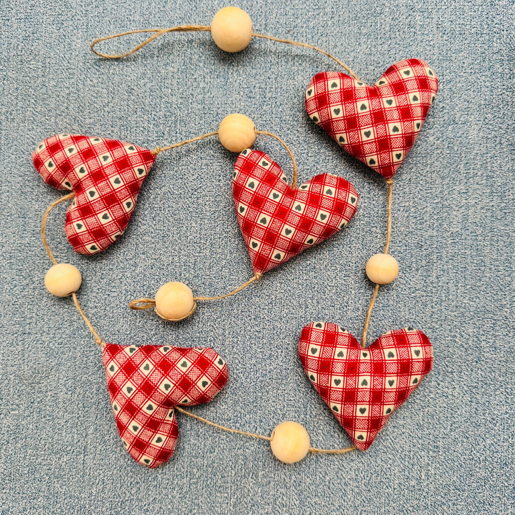 Handmade 'string of love' hanging heart garland