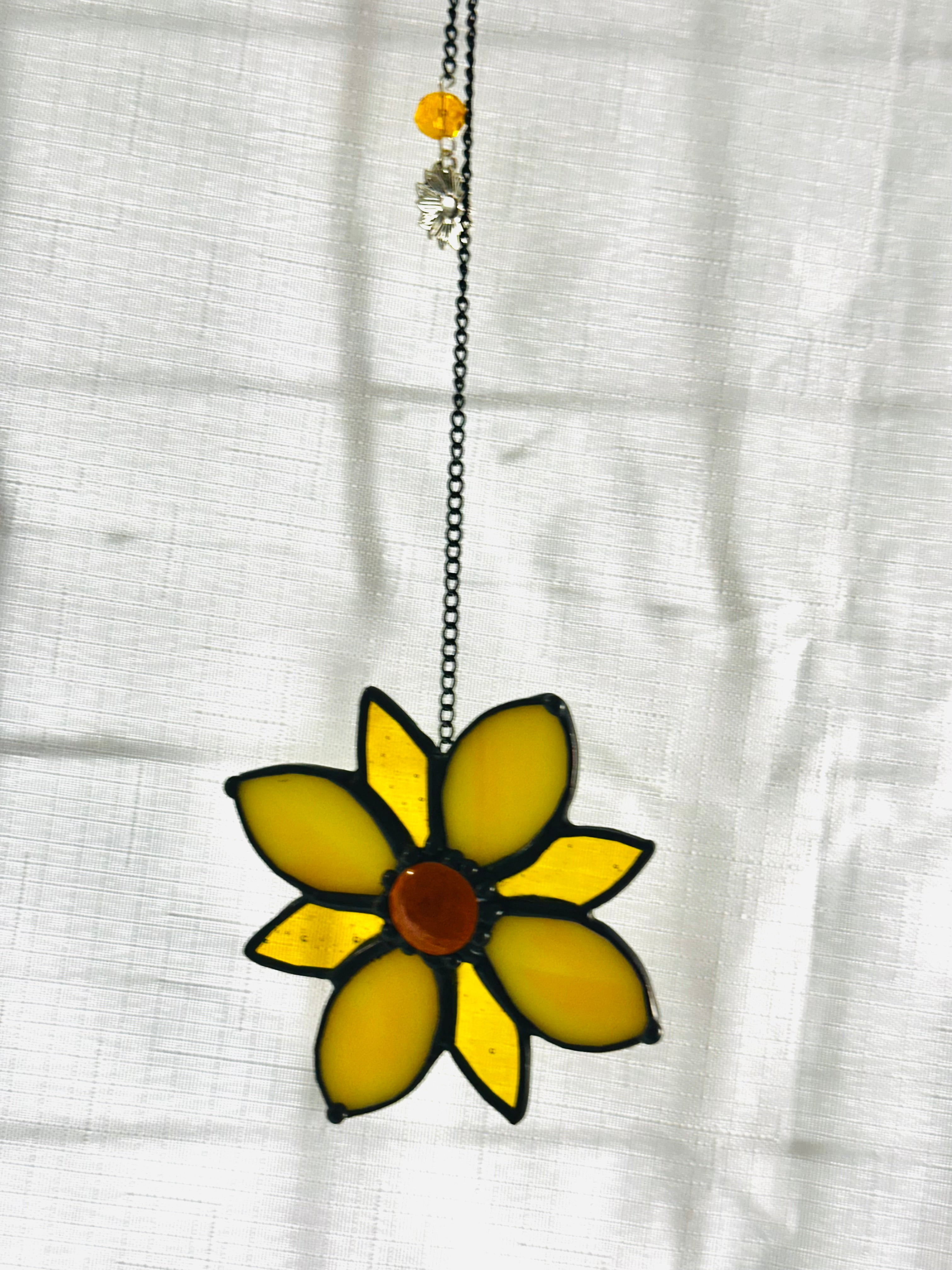 Stained glass flower sun catcher in yellow