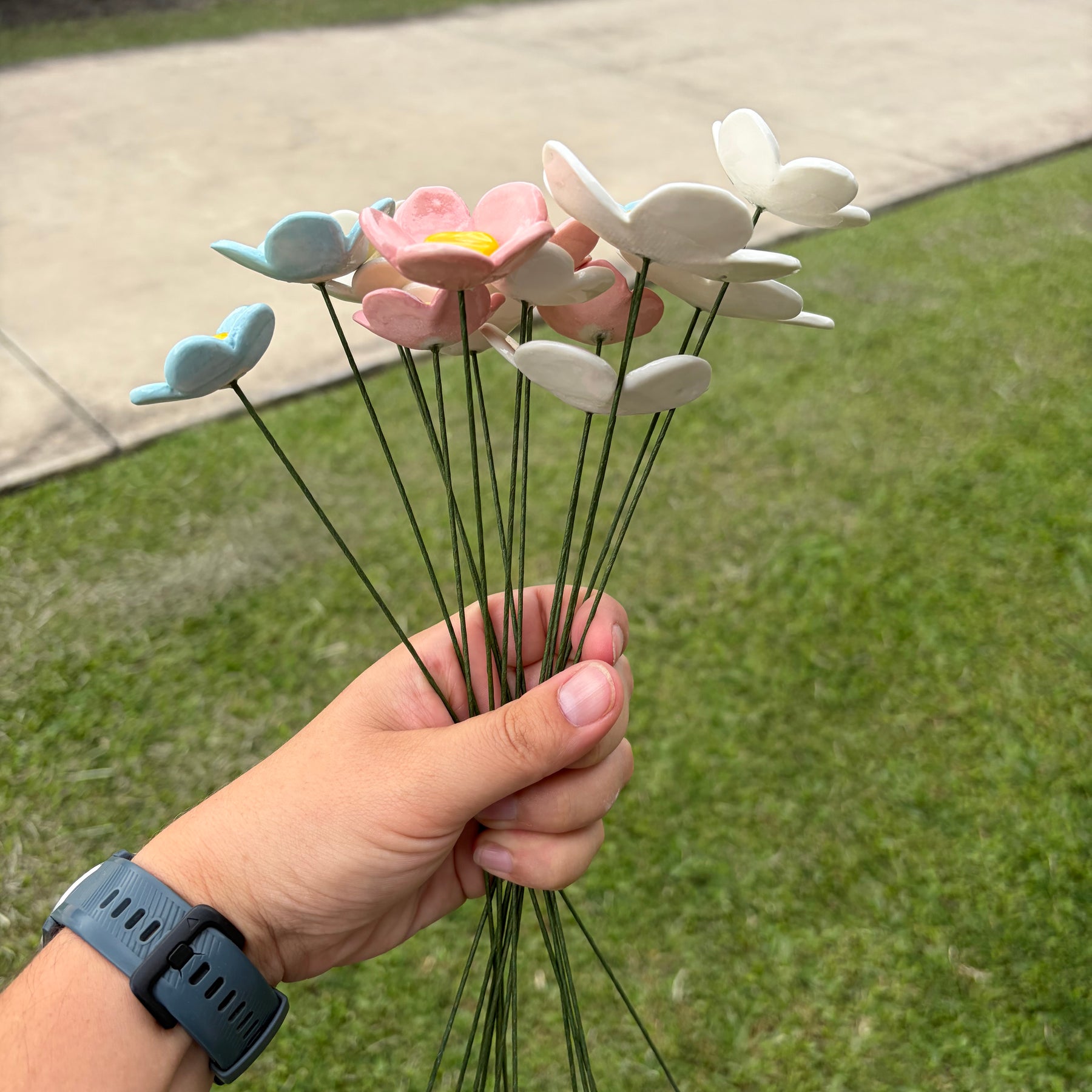 Ceramic flowers - pink, white and blue by the stem!