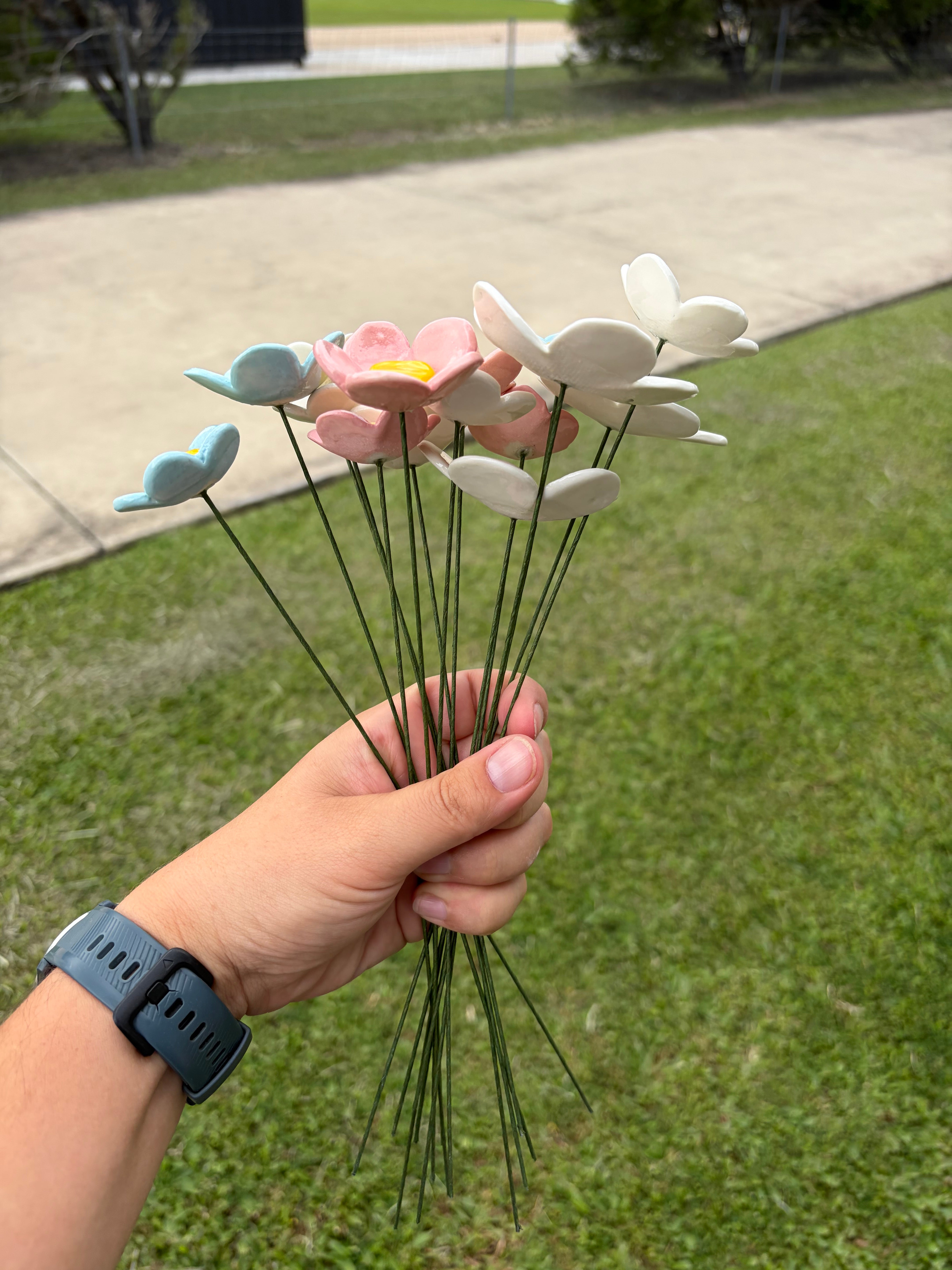 Ceramic flowers - pink, white and blue by the stem!