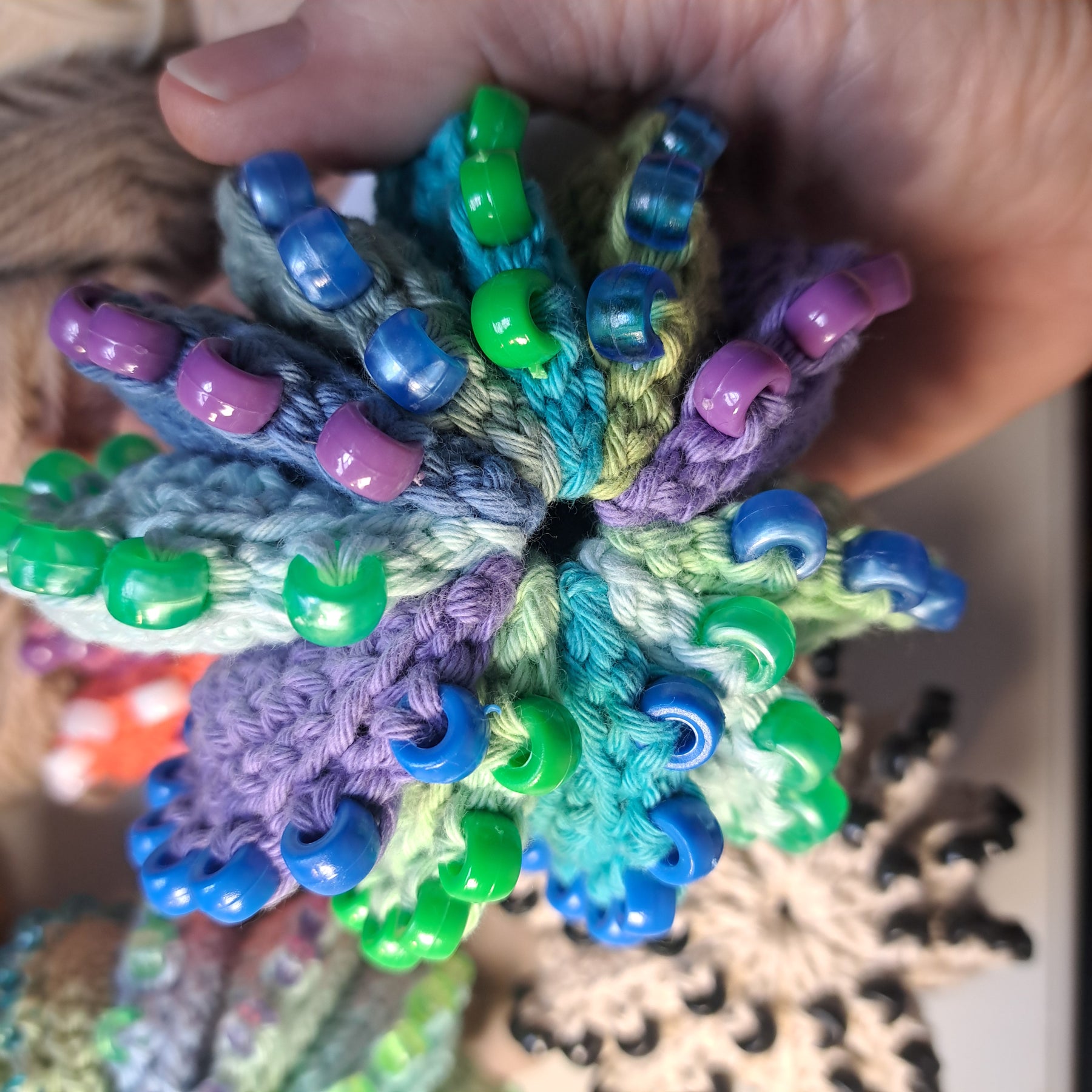 Handmade Crochet fidget stress ball beaded blues and greens