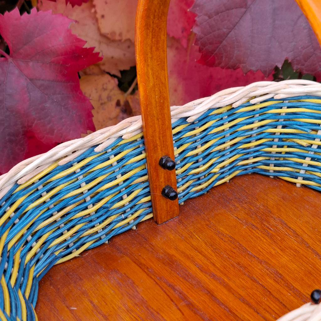 Small rectangular blue yellow basket.