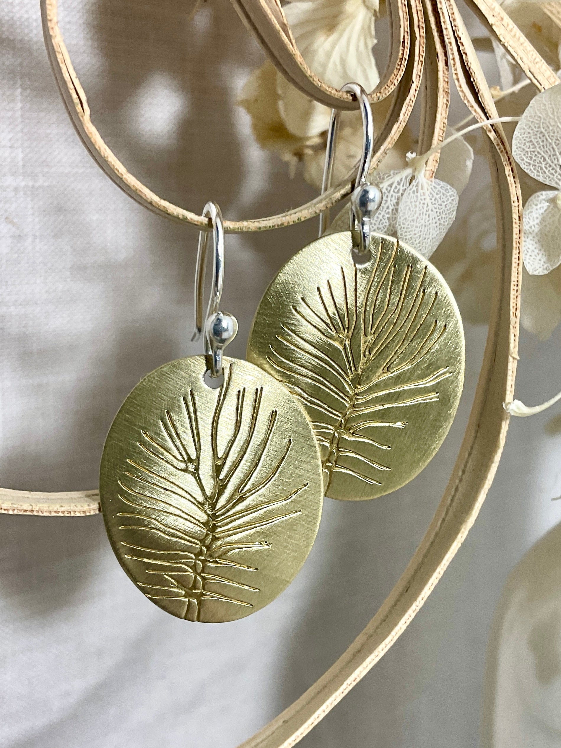 Brass embossed earrings. Handmade