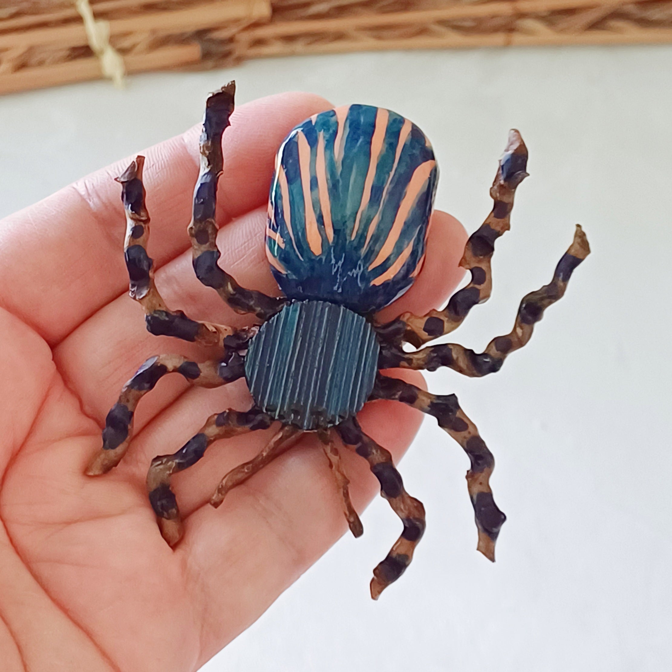Hand painted blue palm leaf clay spider keepsake