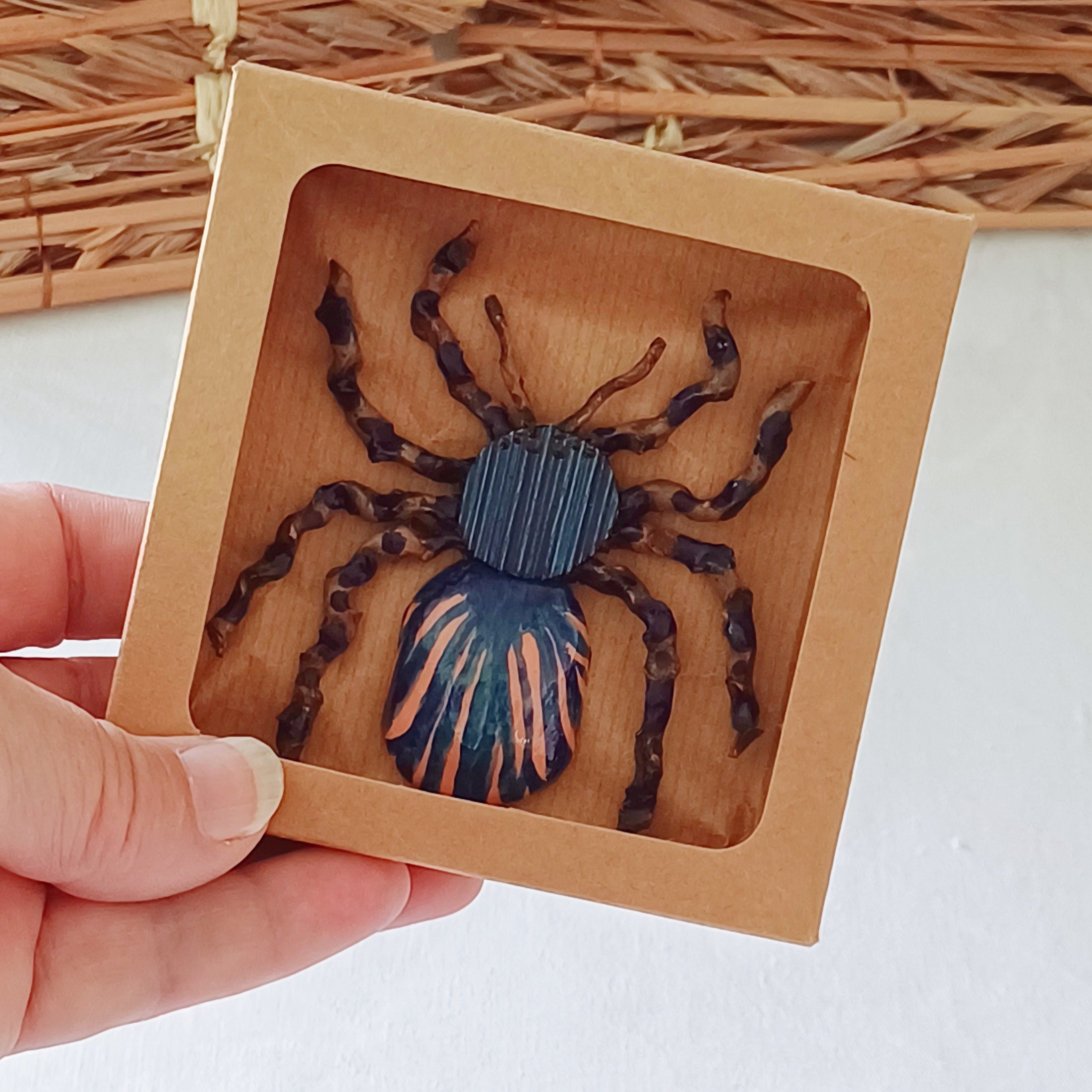Hand painted blue palm leaf clay spider keepsake with magnet