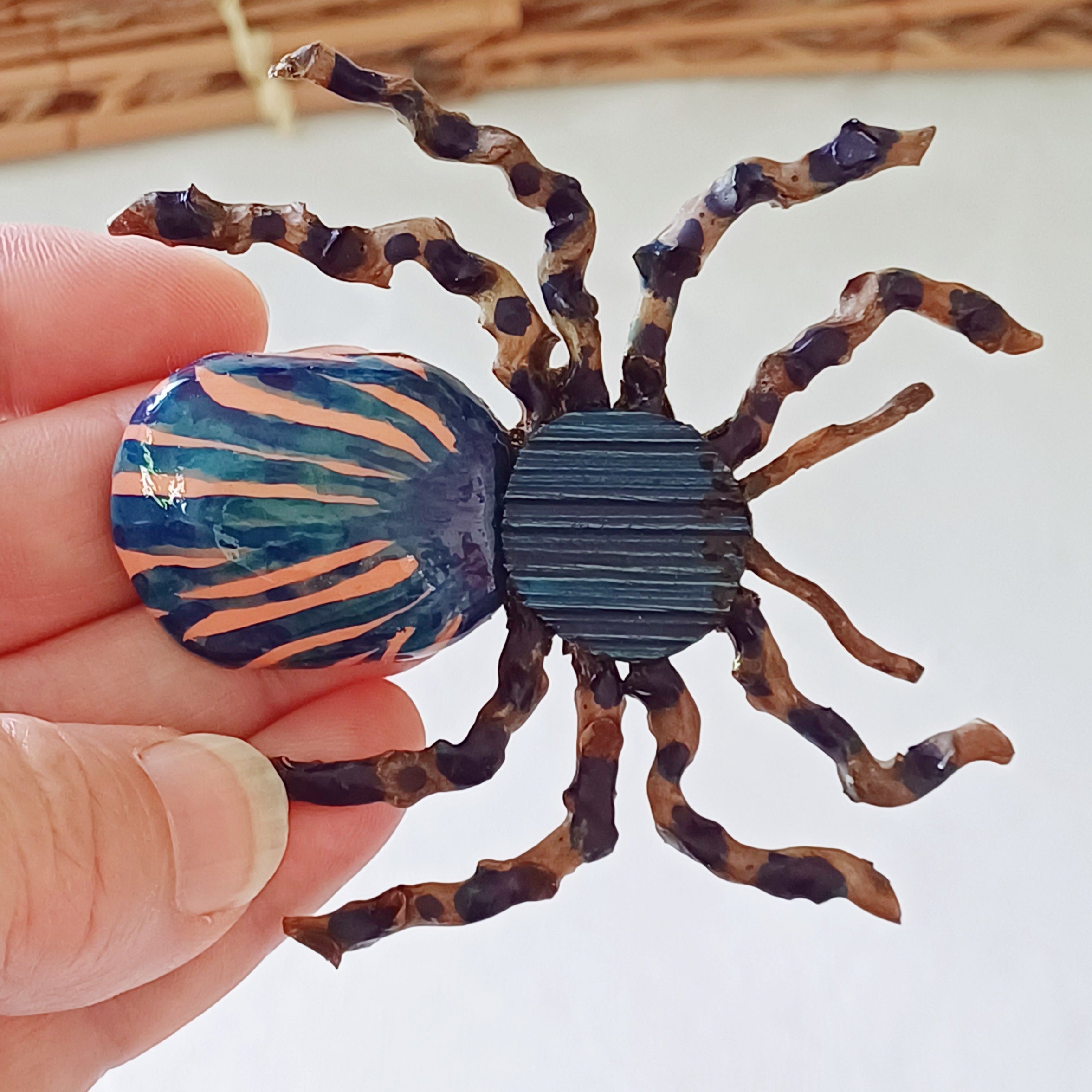 Hand painted blue palm leaf clay spider keepsake with magnet