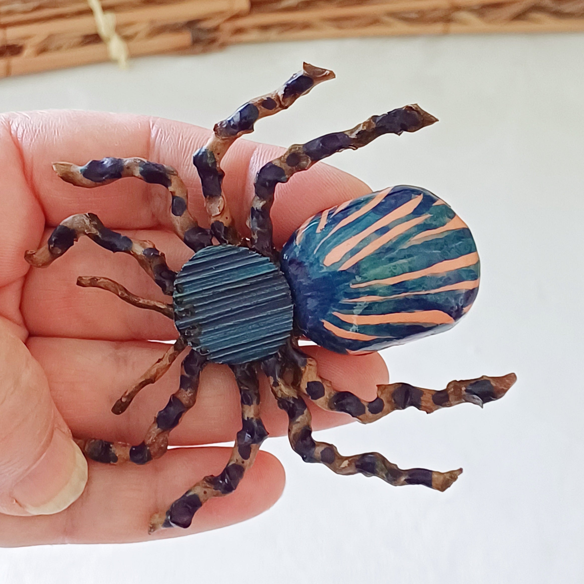 Hand painted blue palm leaf clay spider keepsake with magnet