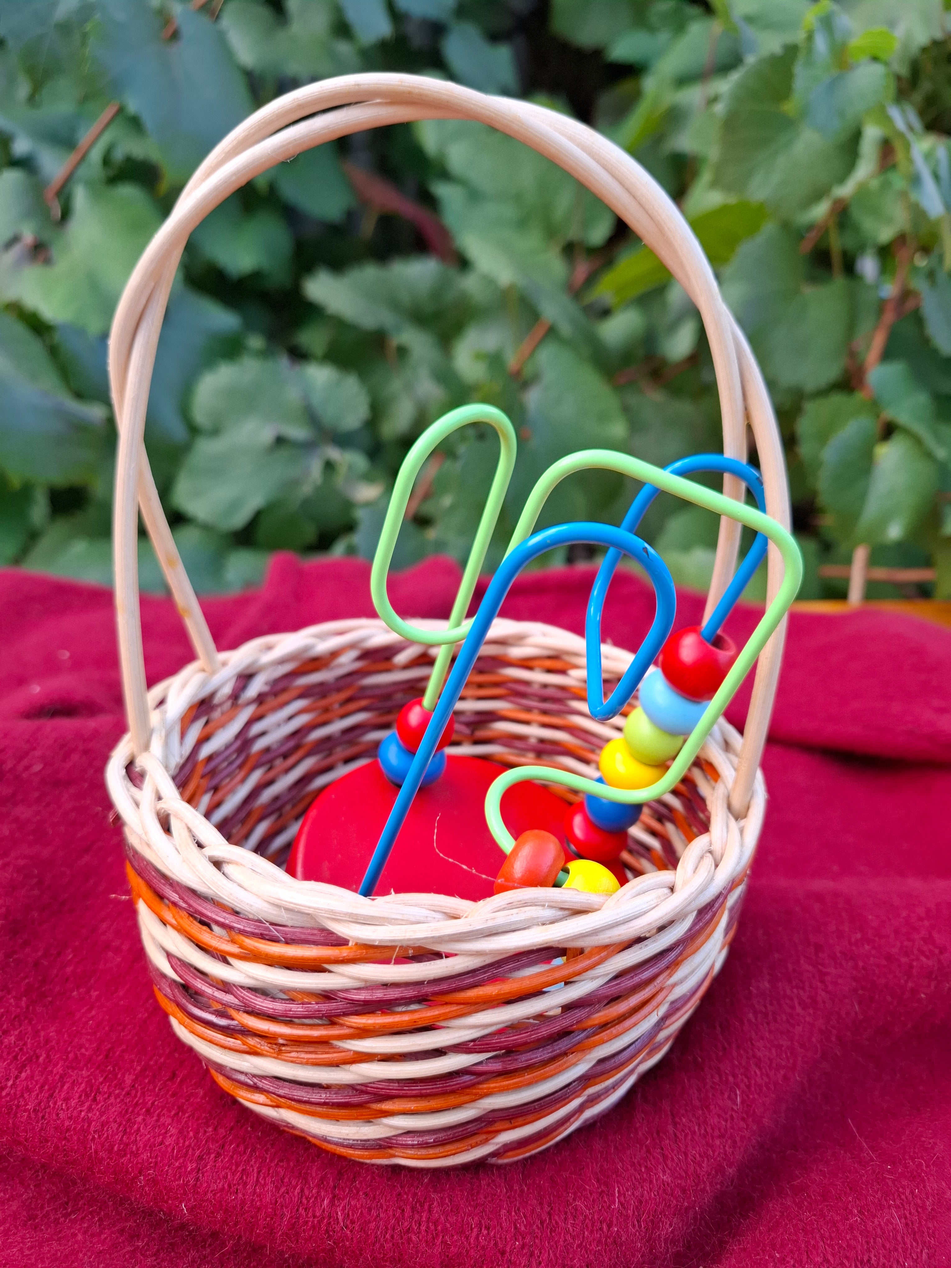 small orange brown handled basket
