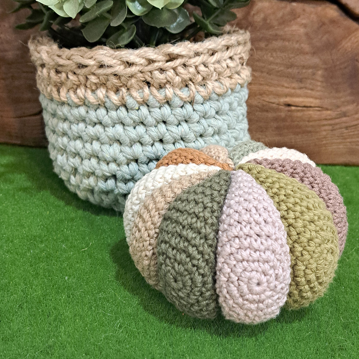 Handmade Crochet sensory ball rattle inside earthy neutral colours