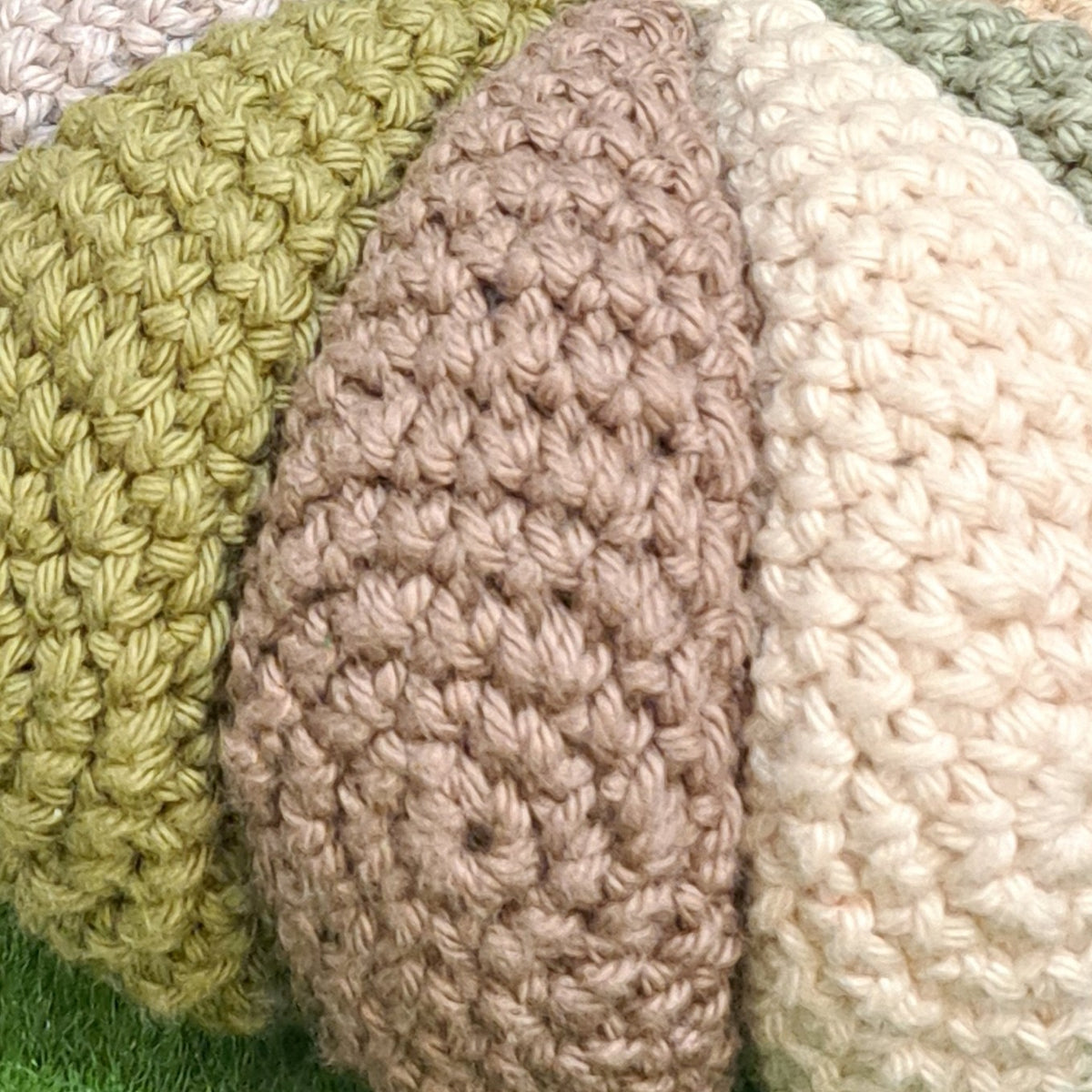 Handmade Crochet sensory ball rattle inside earthy neutral colours
