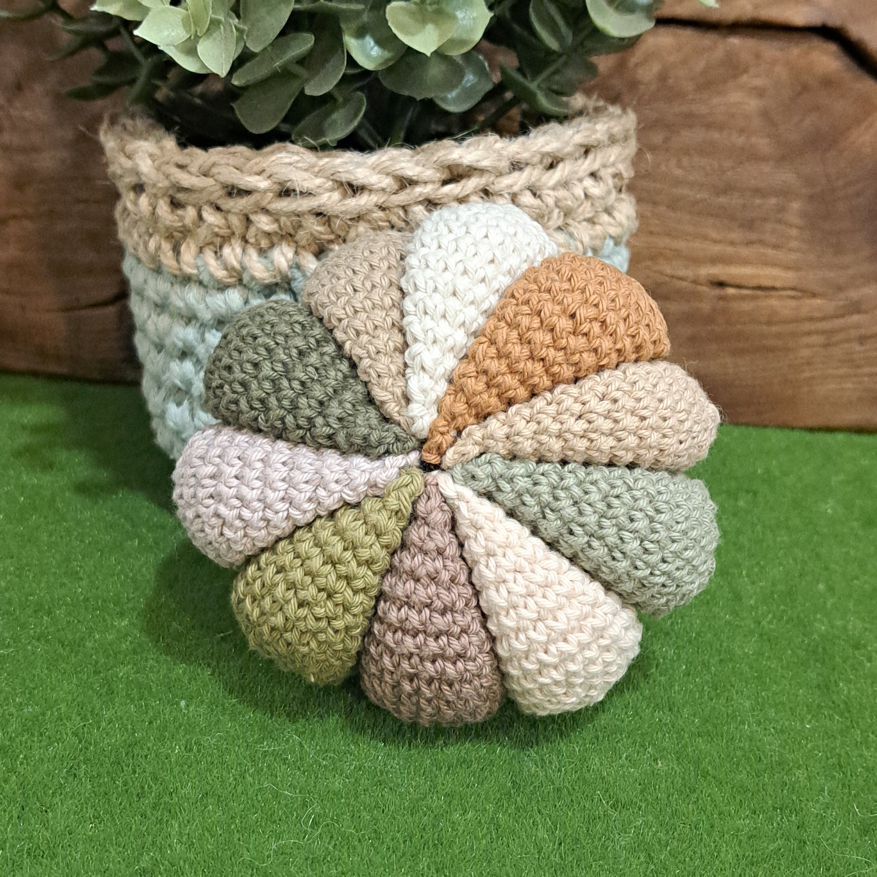 Handmade Crochet sensory ball rattle inside earthy neutral colours