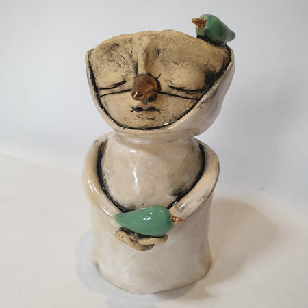 medium clay person, candle, bird