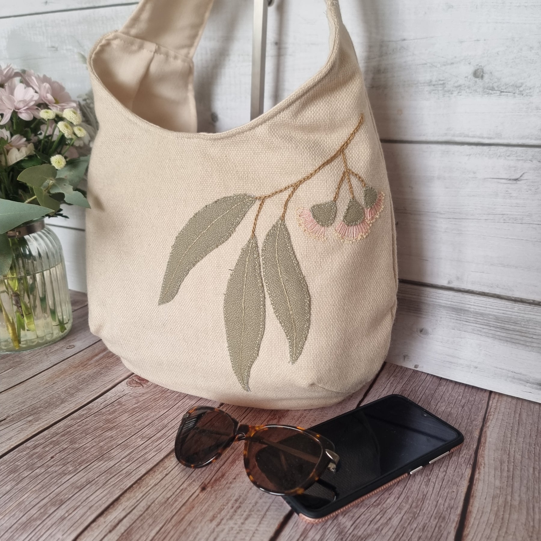 Sadie Jane upcycled hobo bag - appliqued eucalyptus blossom