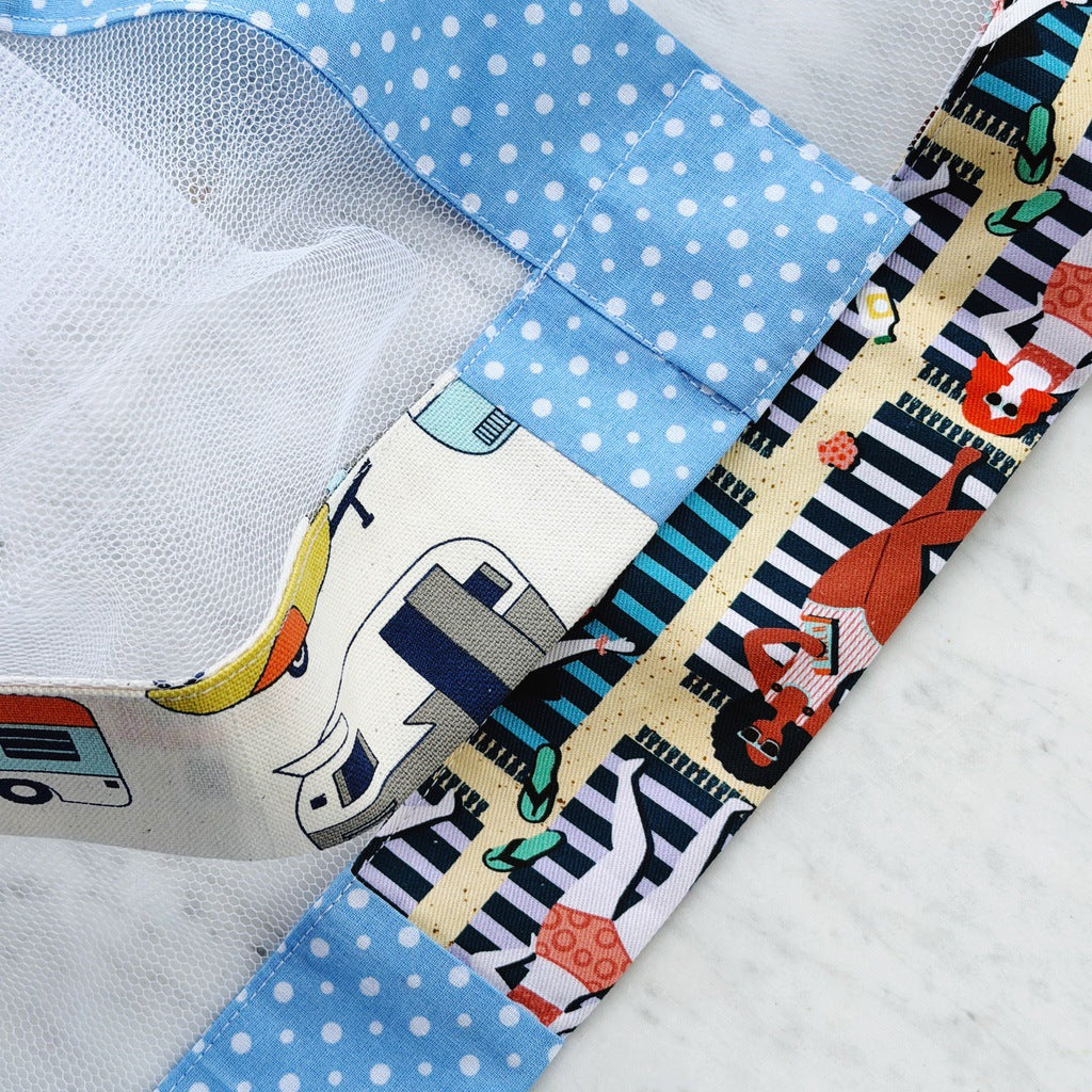 Retro caravan holiday weighted mesh food cover. Charcuterie board net throw. Cheese platter fly cover. Fruit bowl cover.