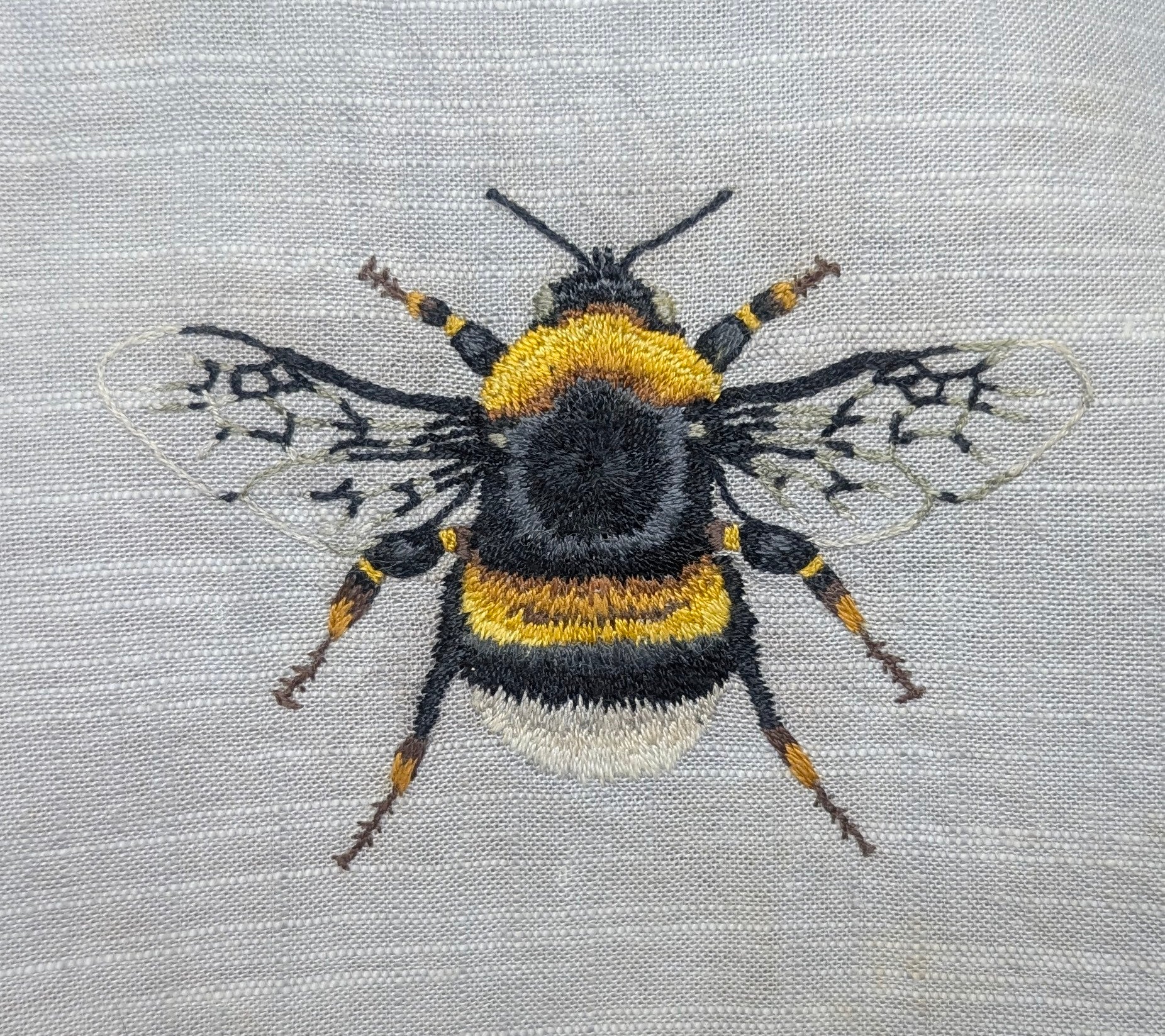 Bee embroidery framed in 6" wooden hoop