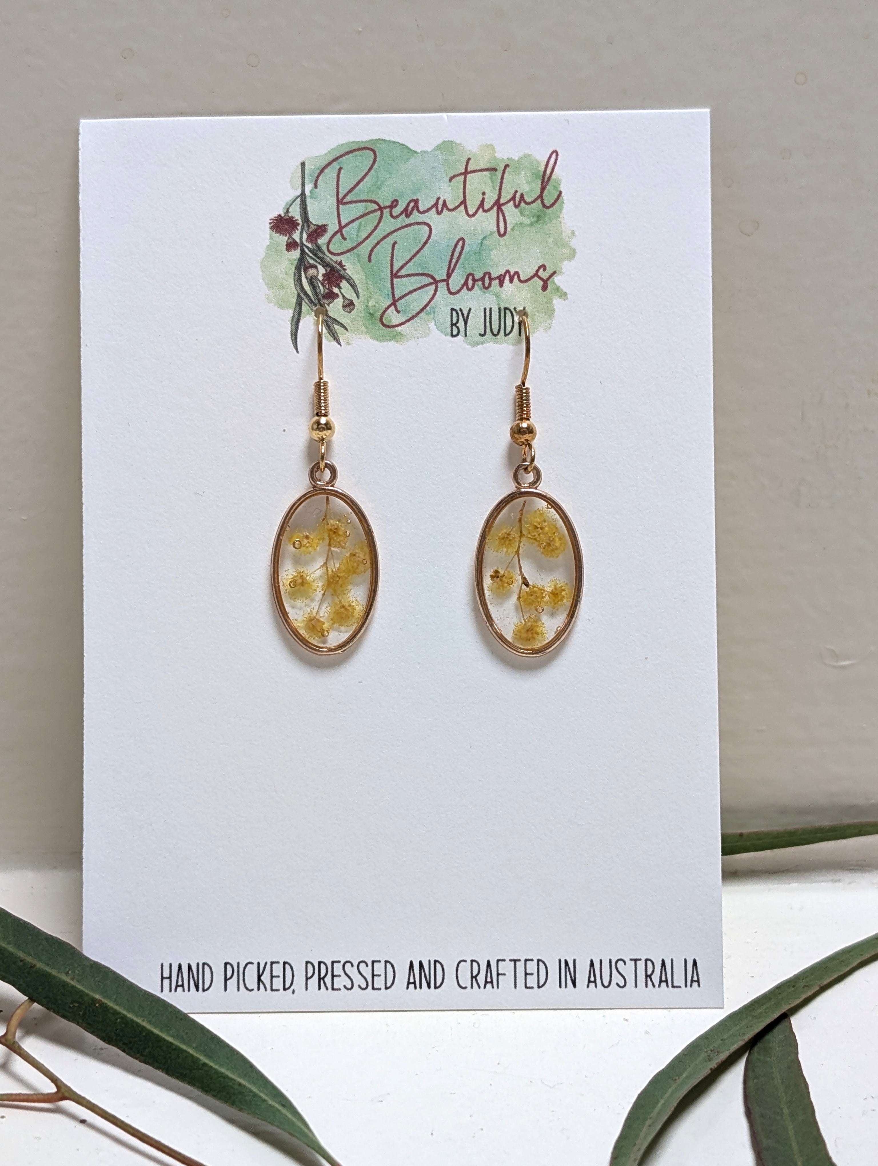 Wattle oval earrings