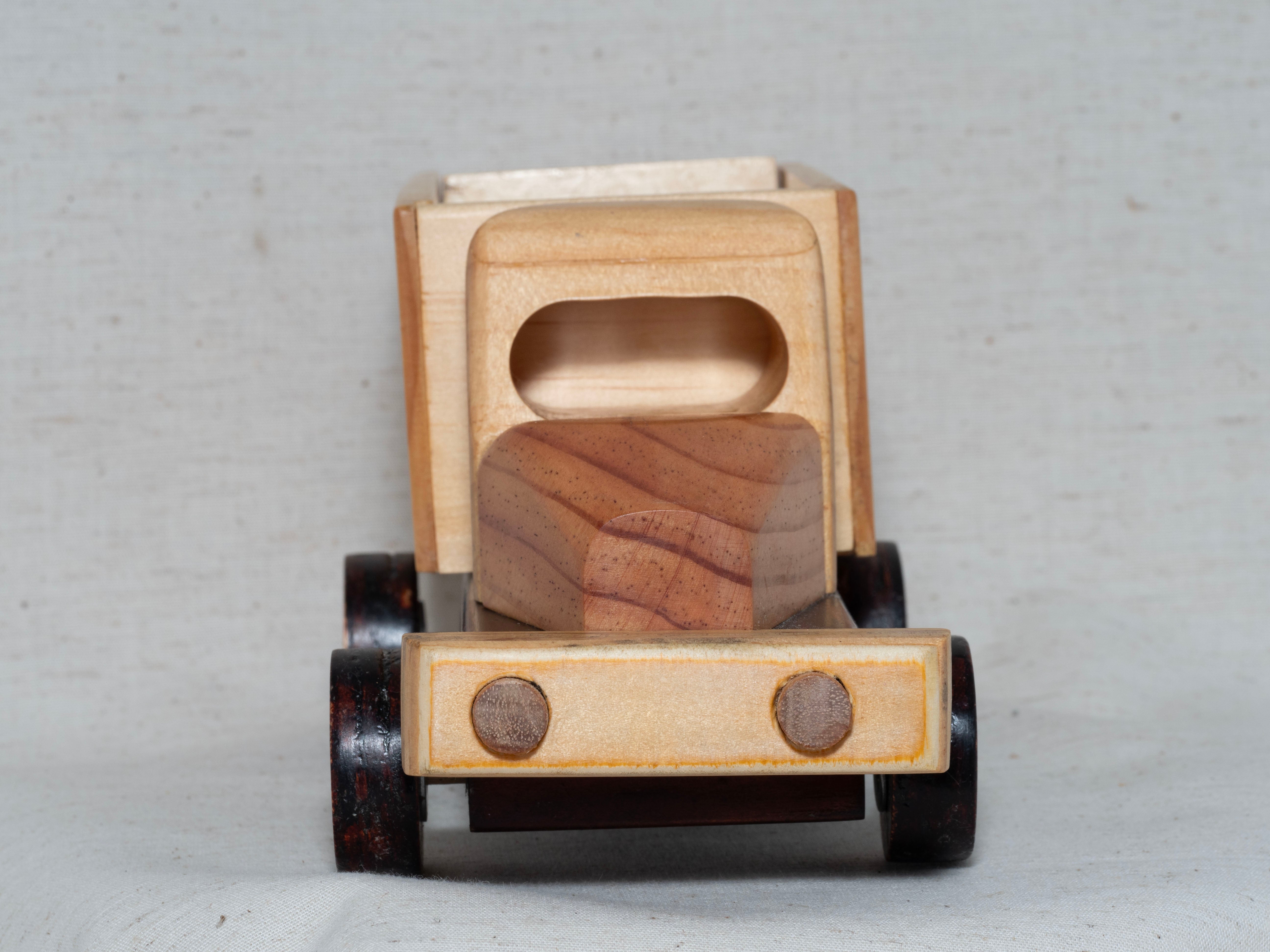 Wooden toy tip-truck