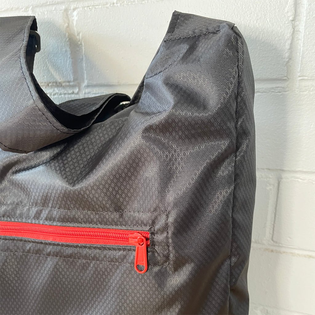 Sling bag with front pocket