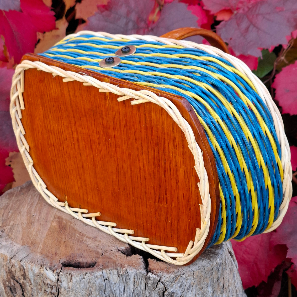 Small rectangular blue yellow basket.