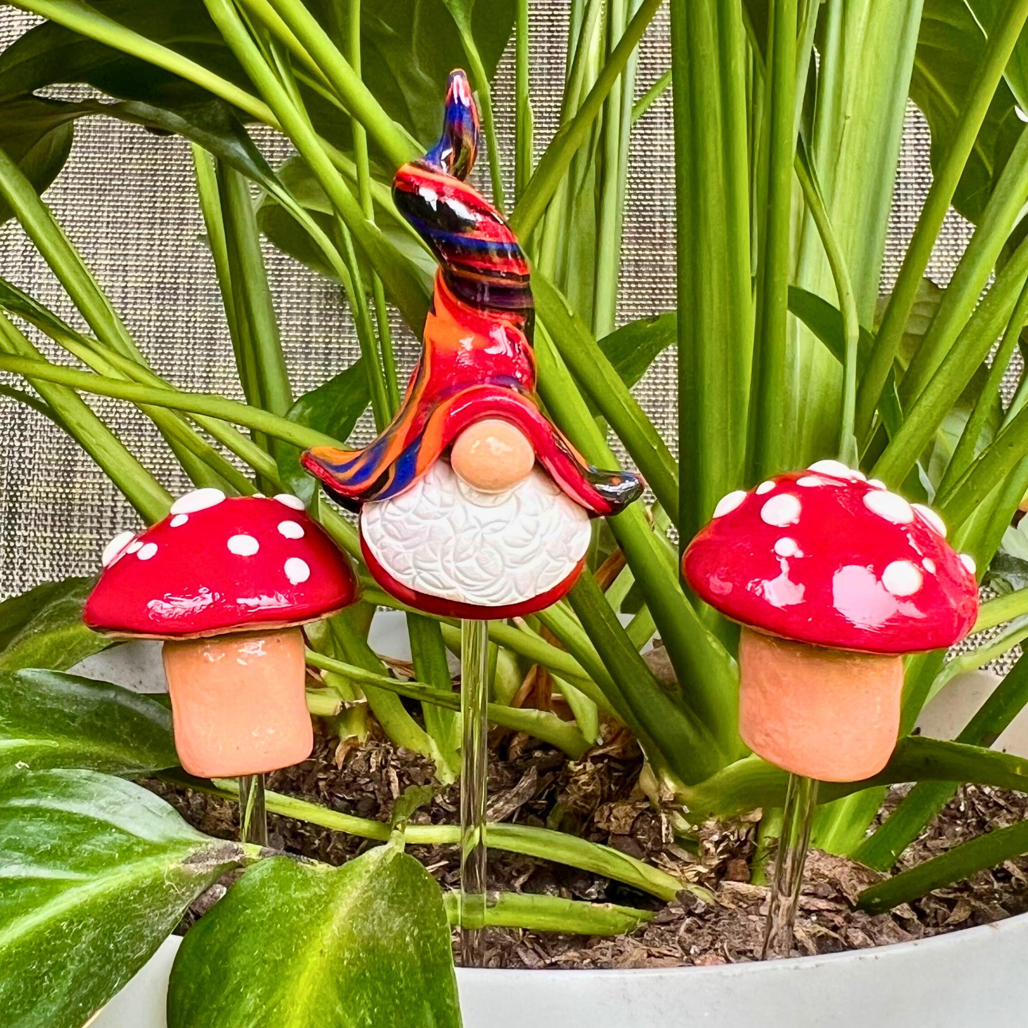 Whimsical gnome Alf & toadstool companions