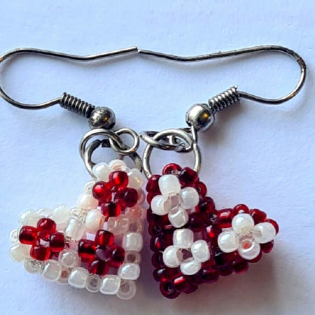 Handmade 3 dimensional beadwoven heart earrings in pink and red