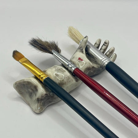 Handmade porcelain ‘helping hand’ brush rest