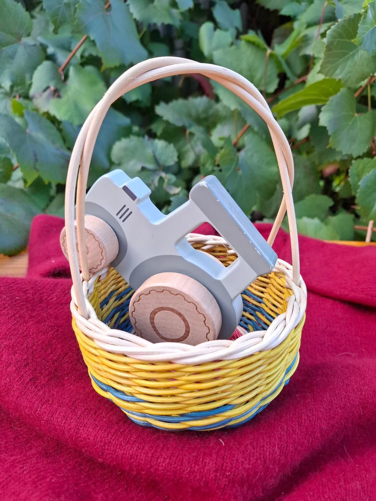 Small blue yellow handled basket
