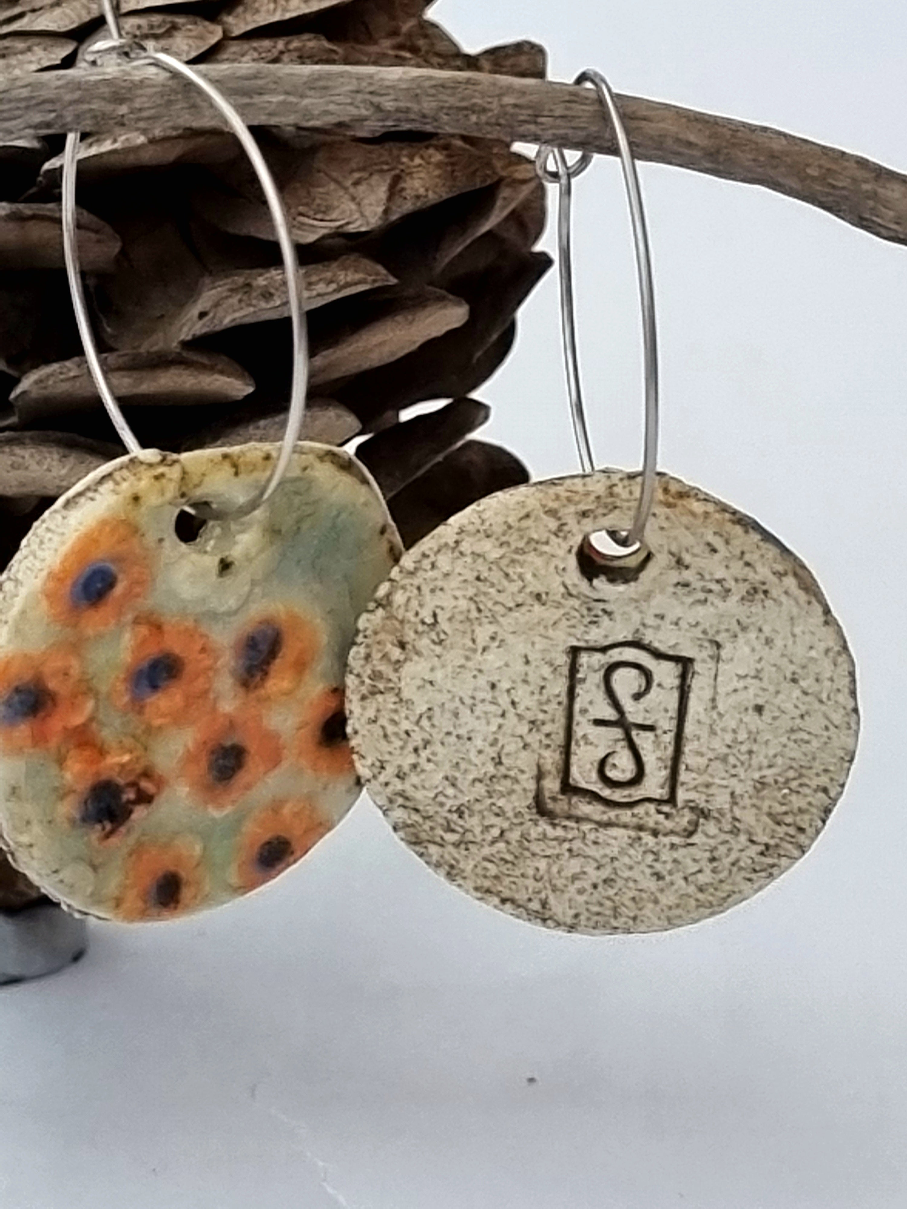Handmade Stoneware Ceramic Earrings, orange floral multi-coloured, 28mm diameter, pierced ears