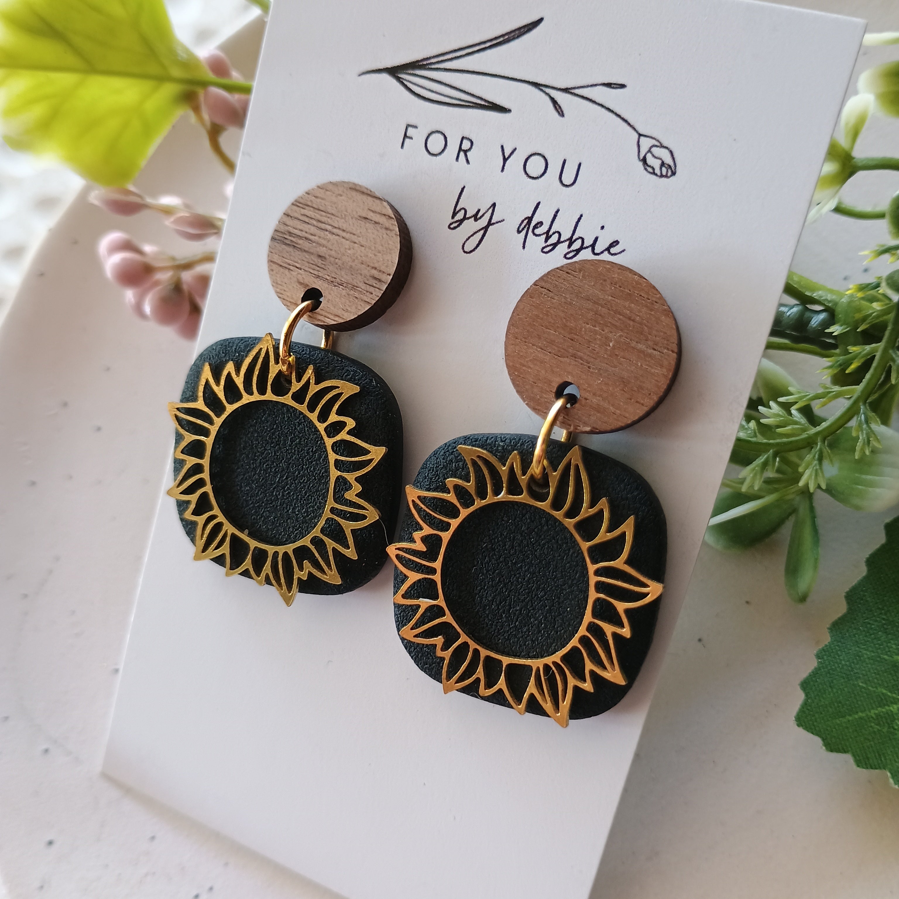 Sun charm dangle earrings- black and wood stud top