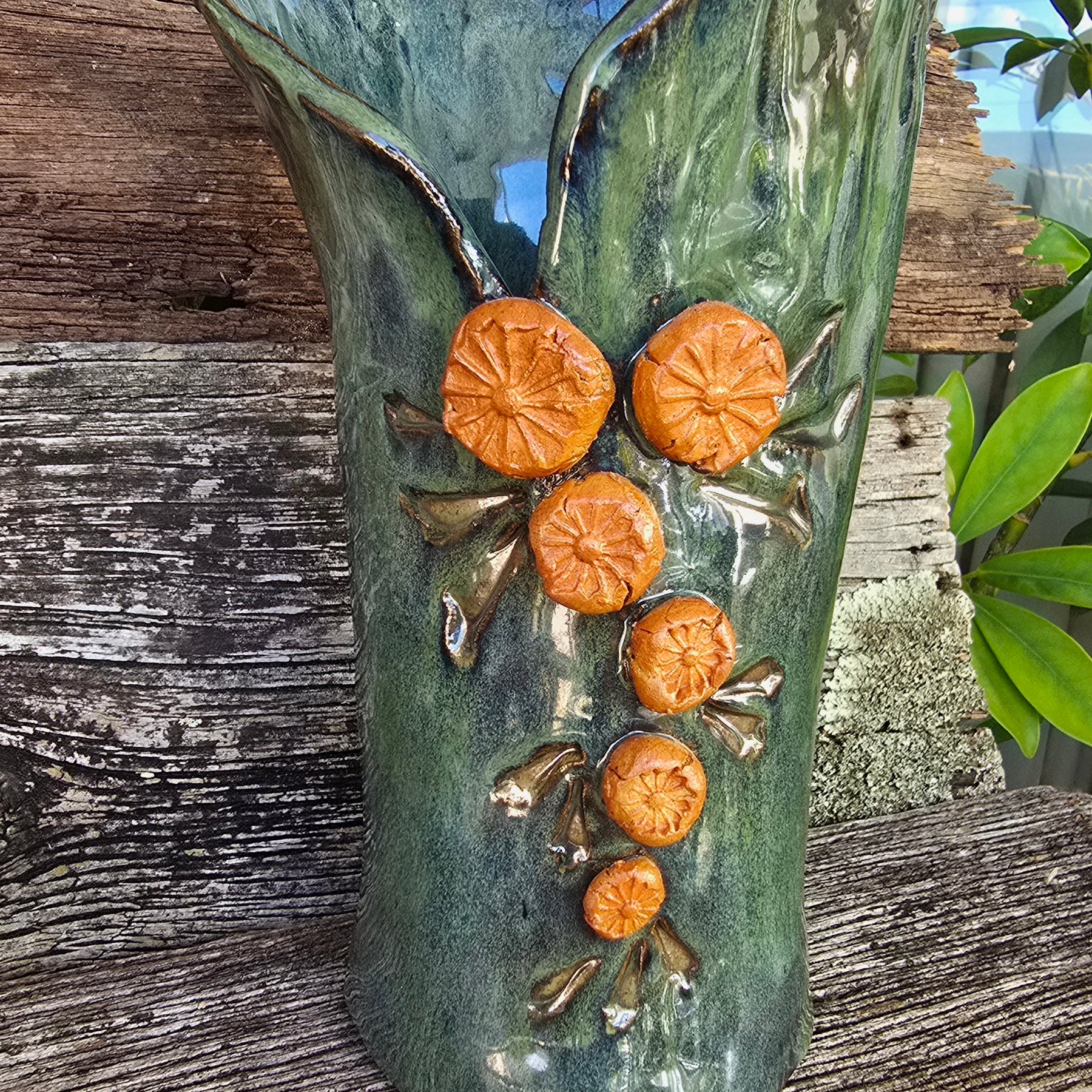Iridescent green vase