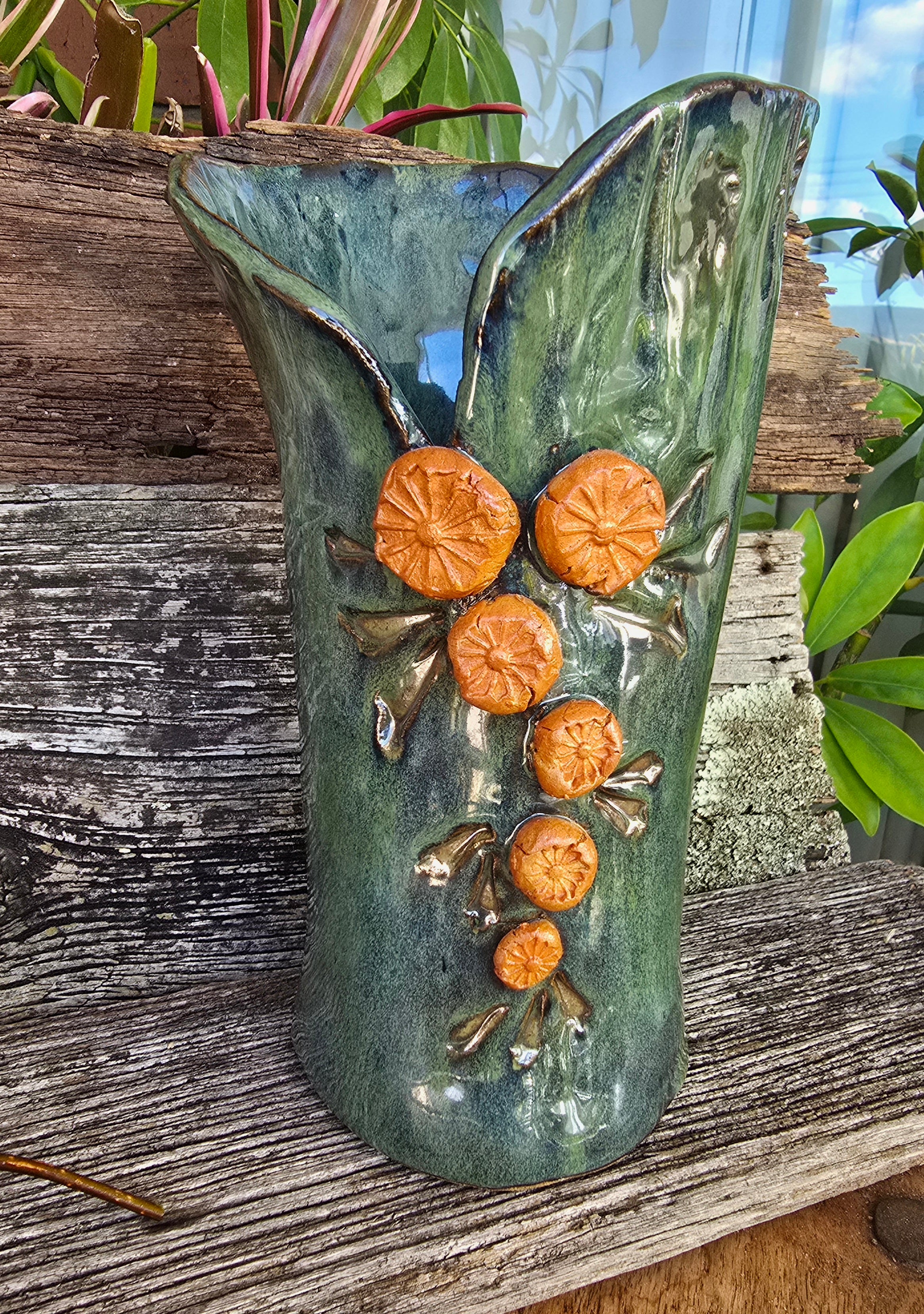 Iridescent green vase