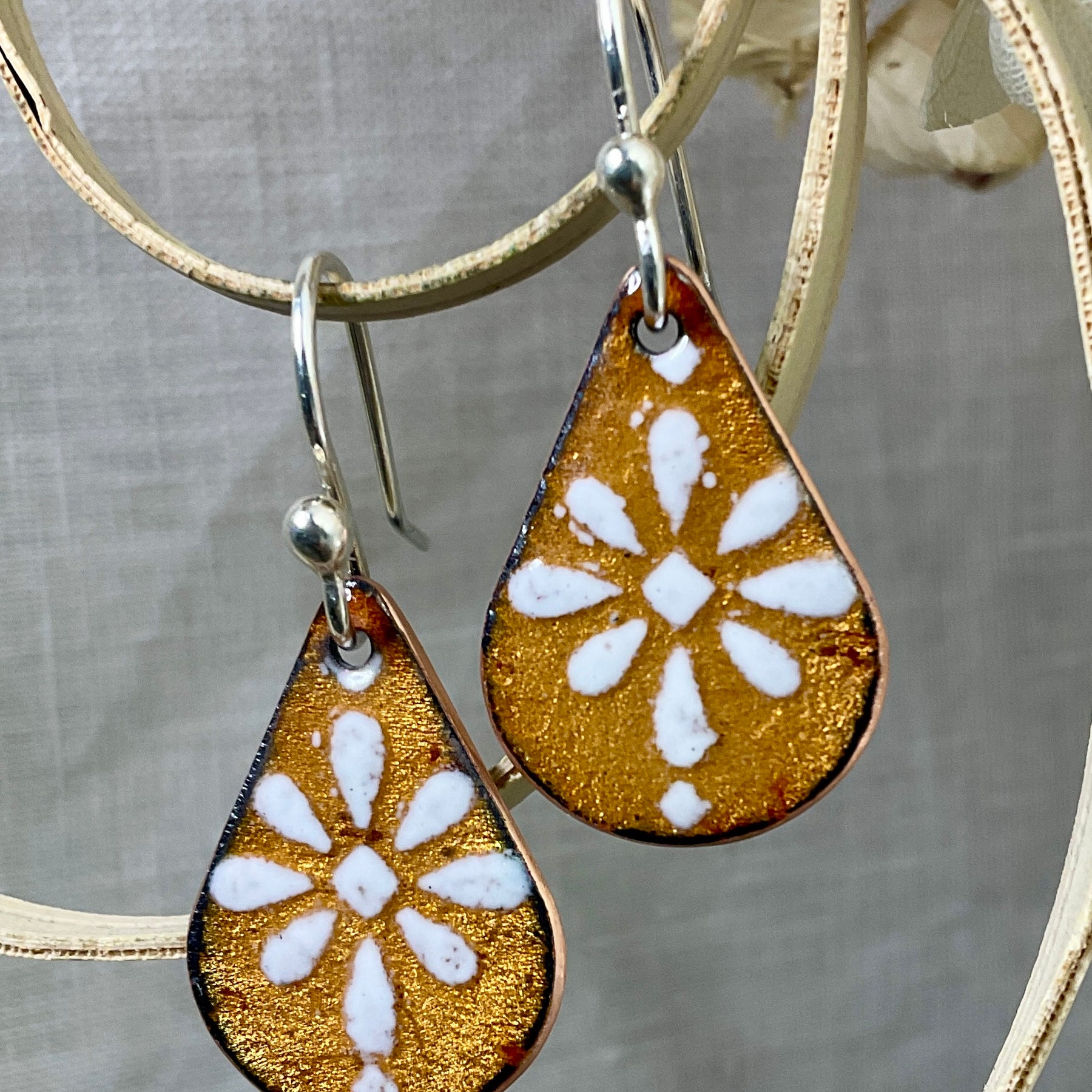 Golden and white pattern earrings. Enamel. Handmade