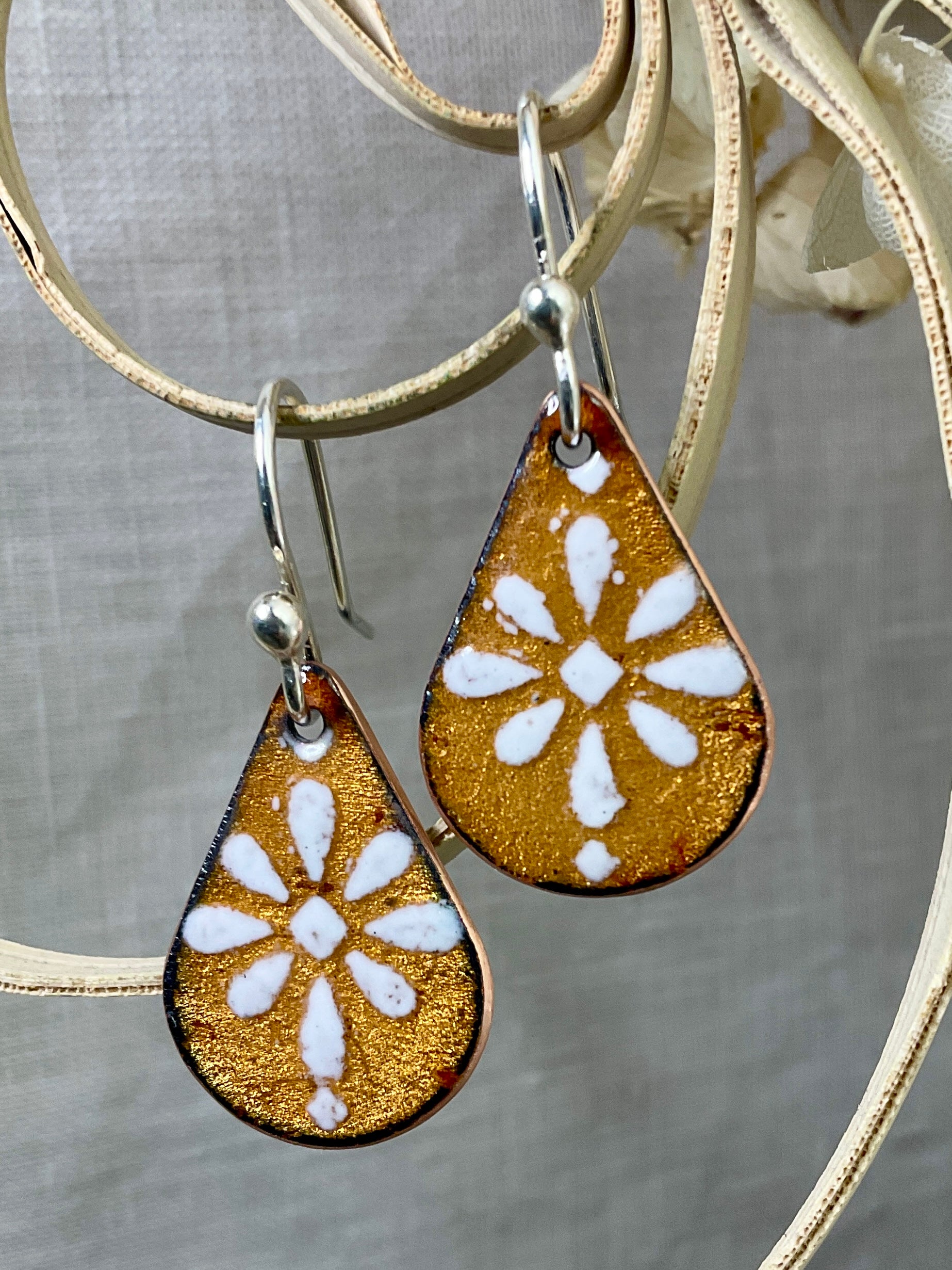 Golden and white pattern earrings. Enamel. Handmade