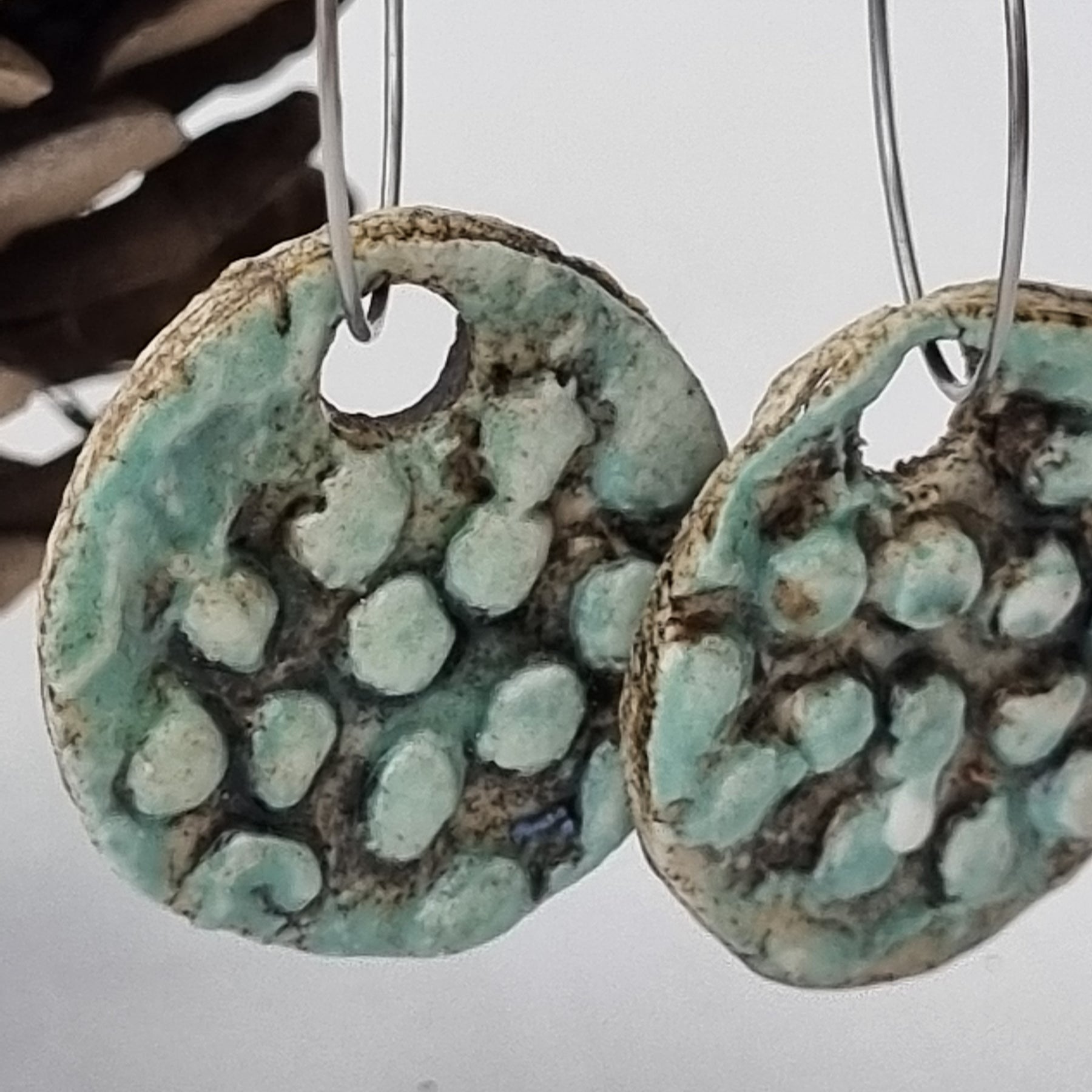 Handmade Stoneware Ceramic Earrings, blue-green black multi-coloured, 28mm diameter, pierced ears