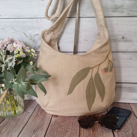Sadie Jane upcycled hobo bag - appliqued eucalyptus blossom
