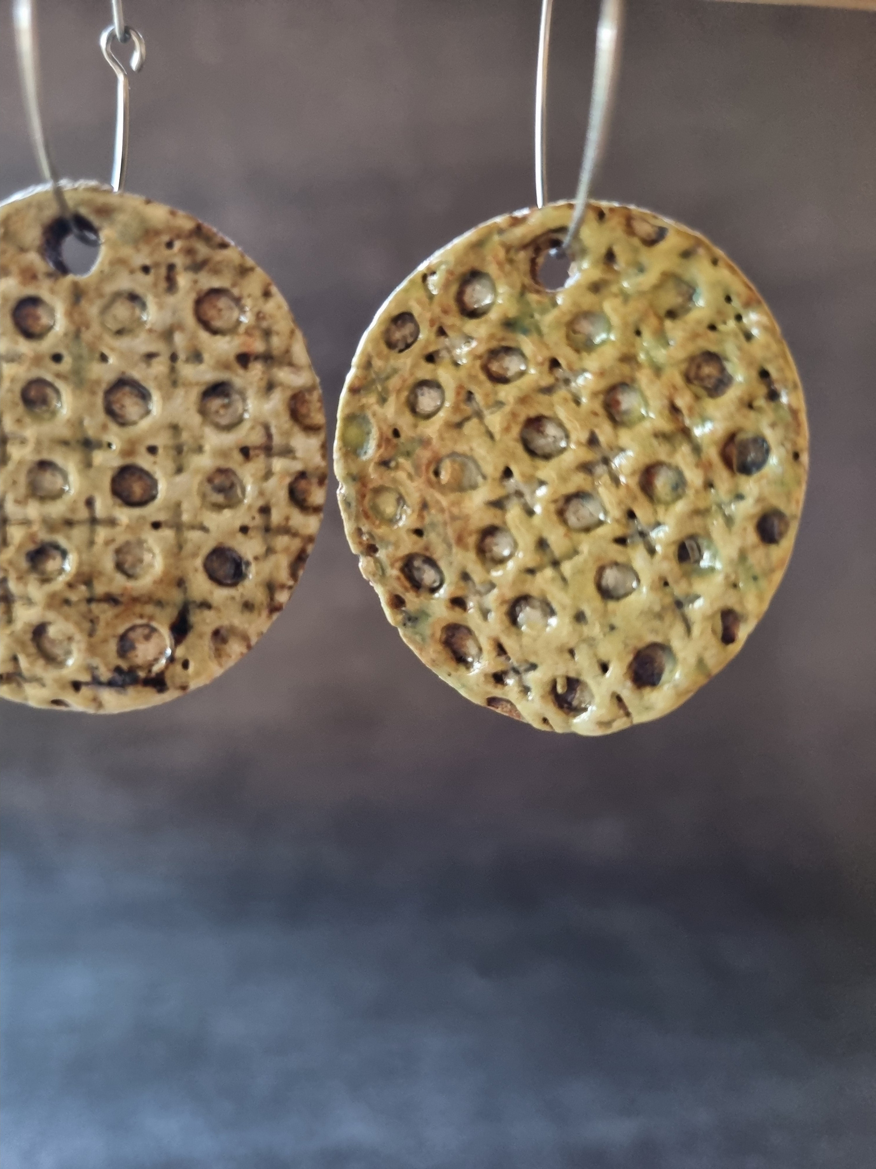 Handmade Stoneware Ceramic Earrings, muted green lattice multi-coloured, 35mm diameter, pierced ears