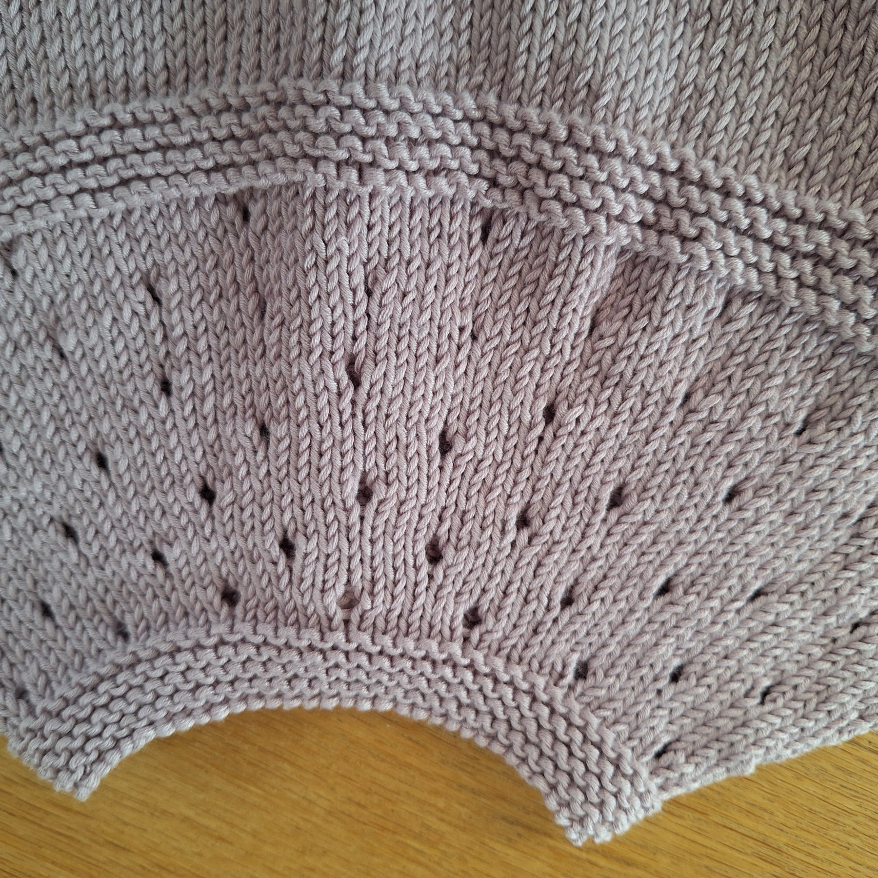 Handknitted Baby Cardigan in 100% natural Lilac yarn
