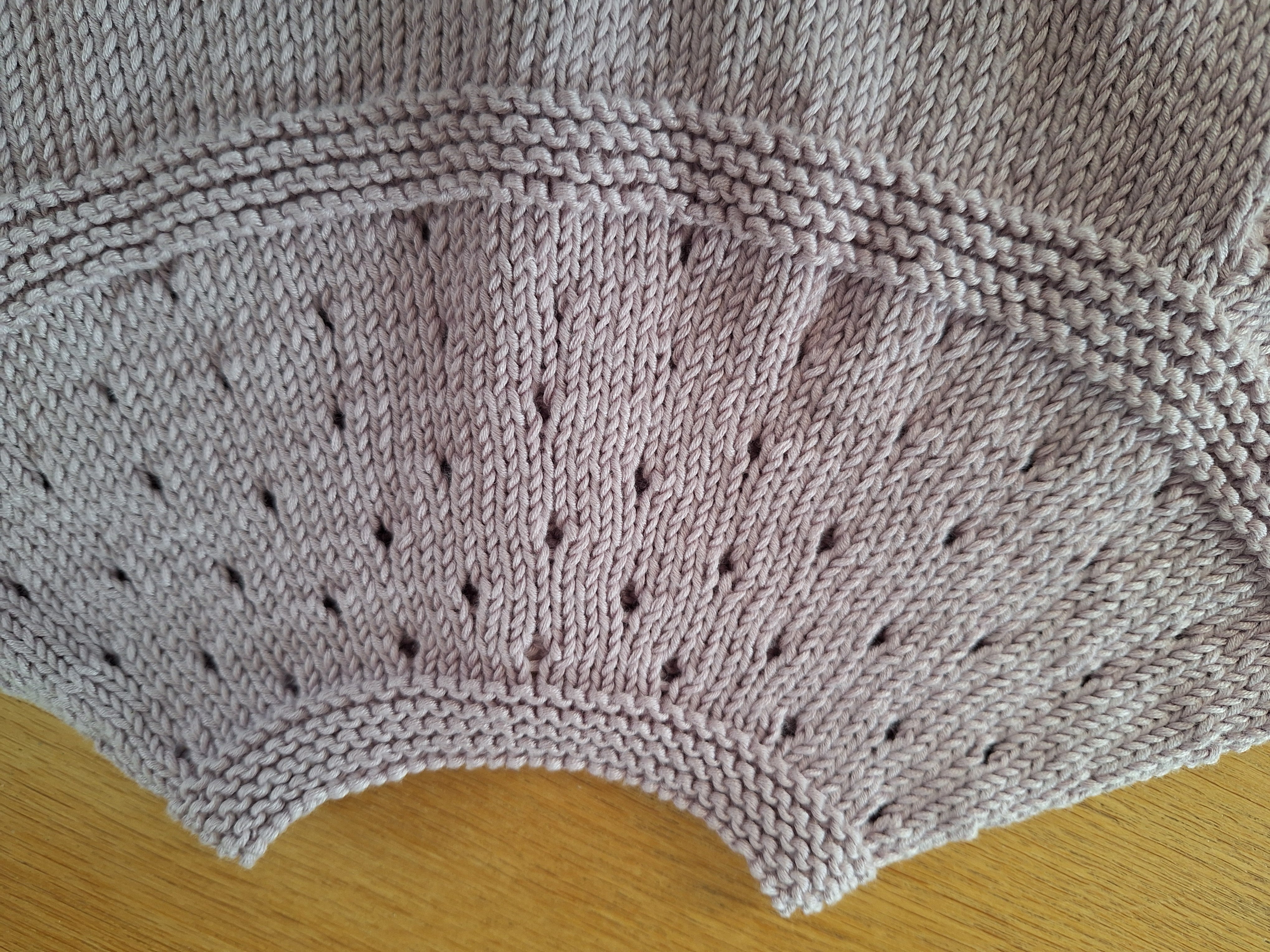 Handknitted Baby Cardigan in 100% natural Lilac yarn