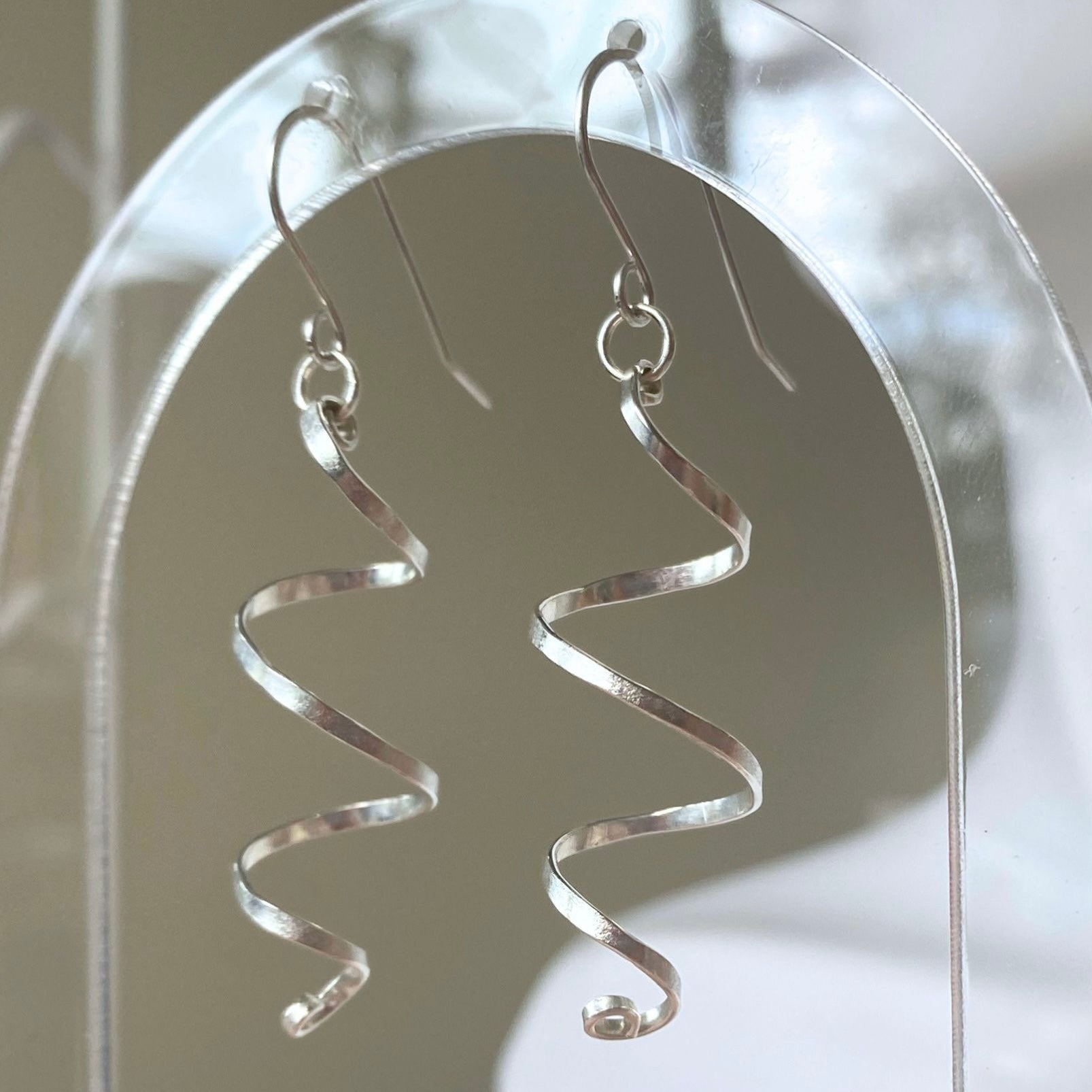 Long spiralling dangle earrings | Sterling silver | Wire jewellery